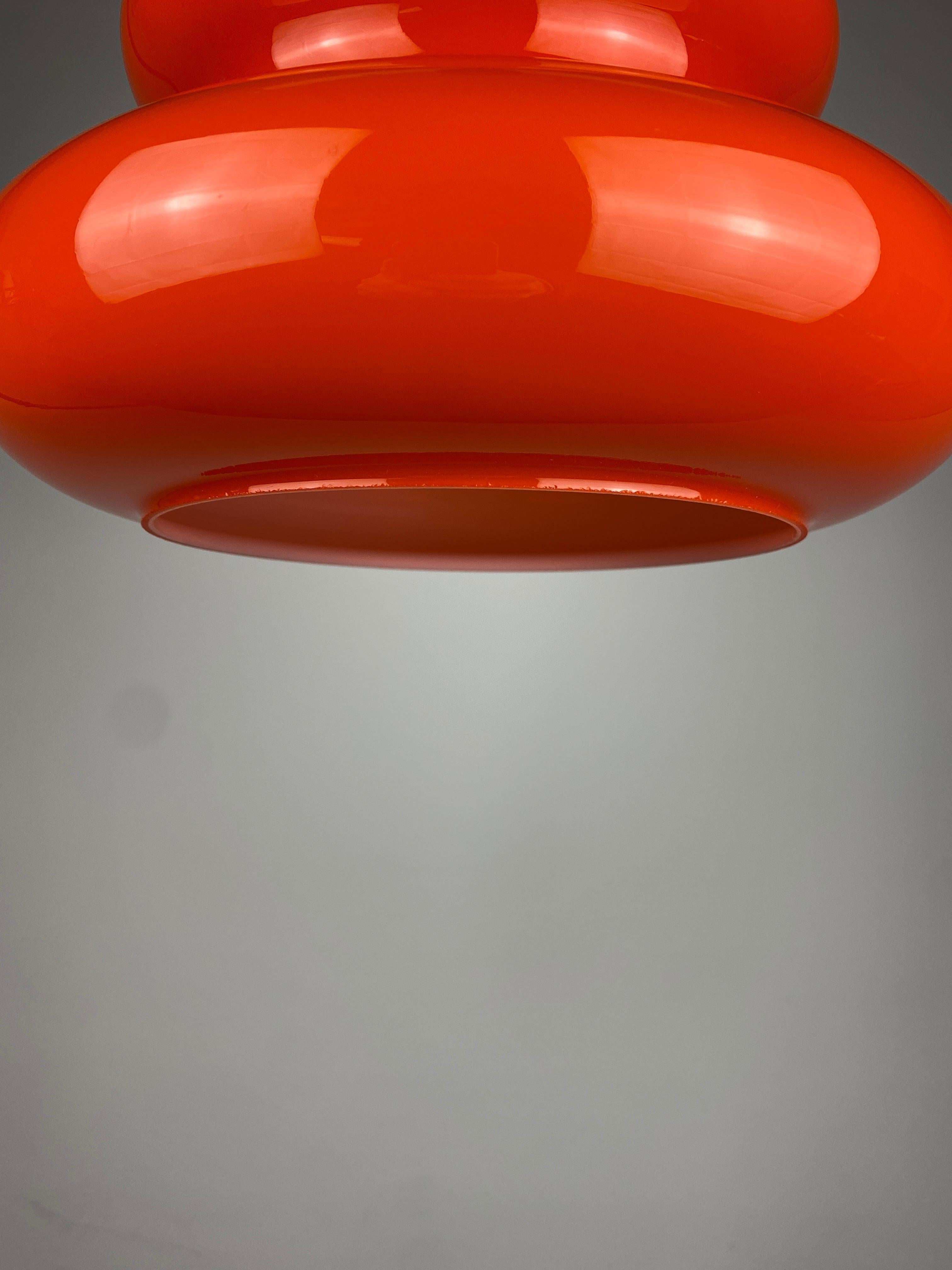 German One of five Vintage Bright Orange Glass Pendant Light by Peill and Putzler 1960 For Sale