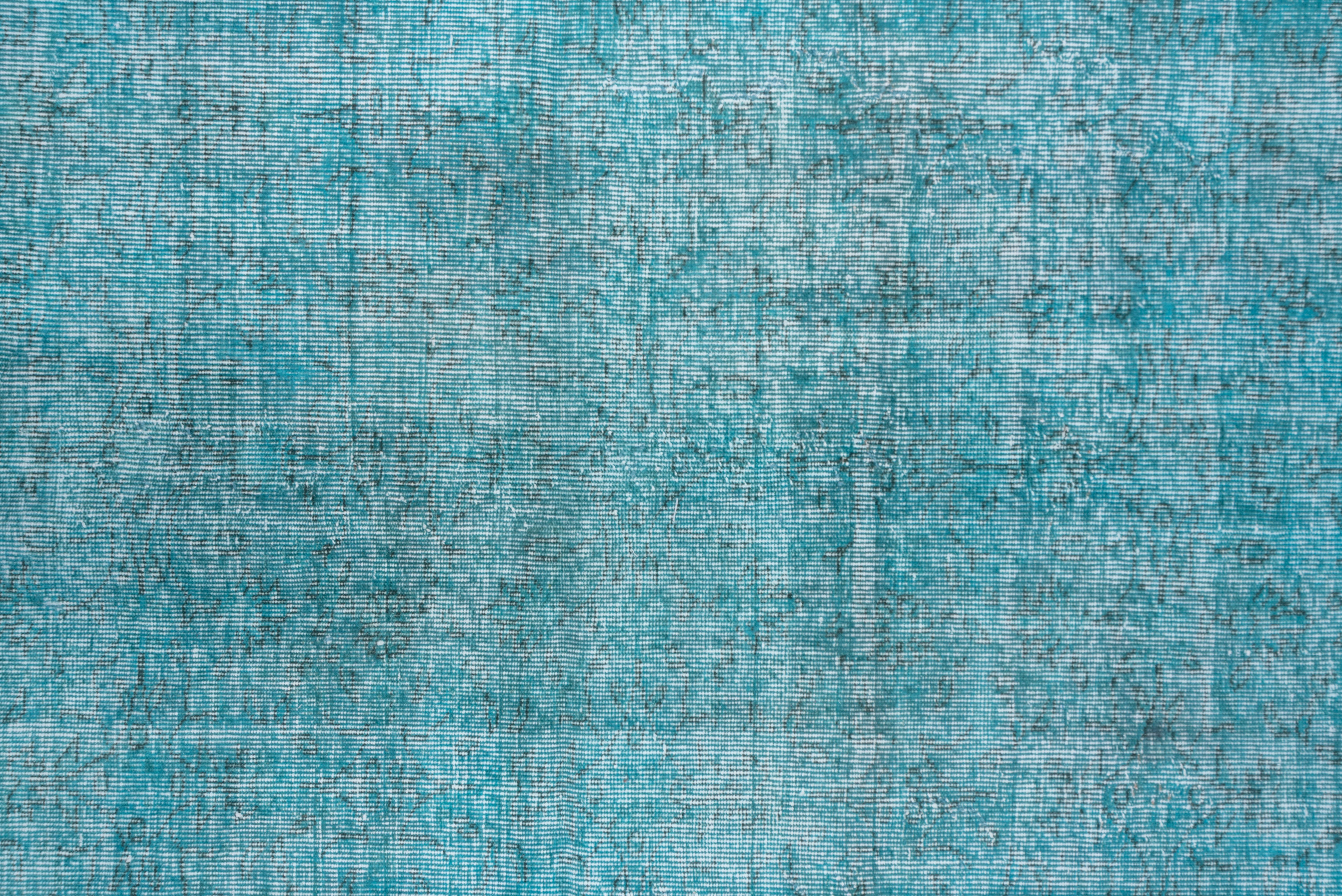 overdyed turquoise rug