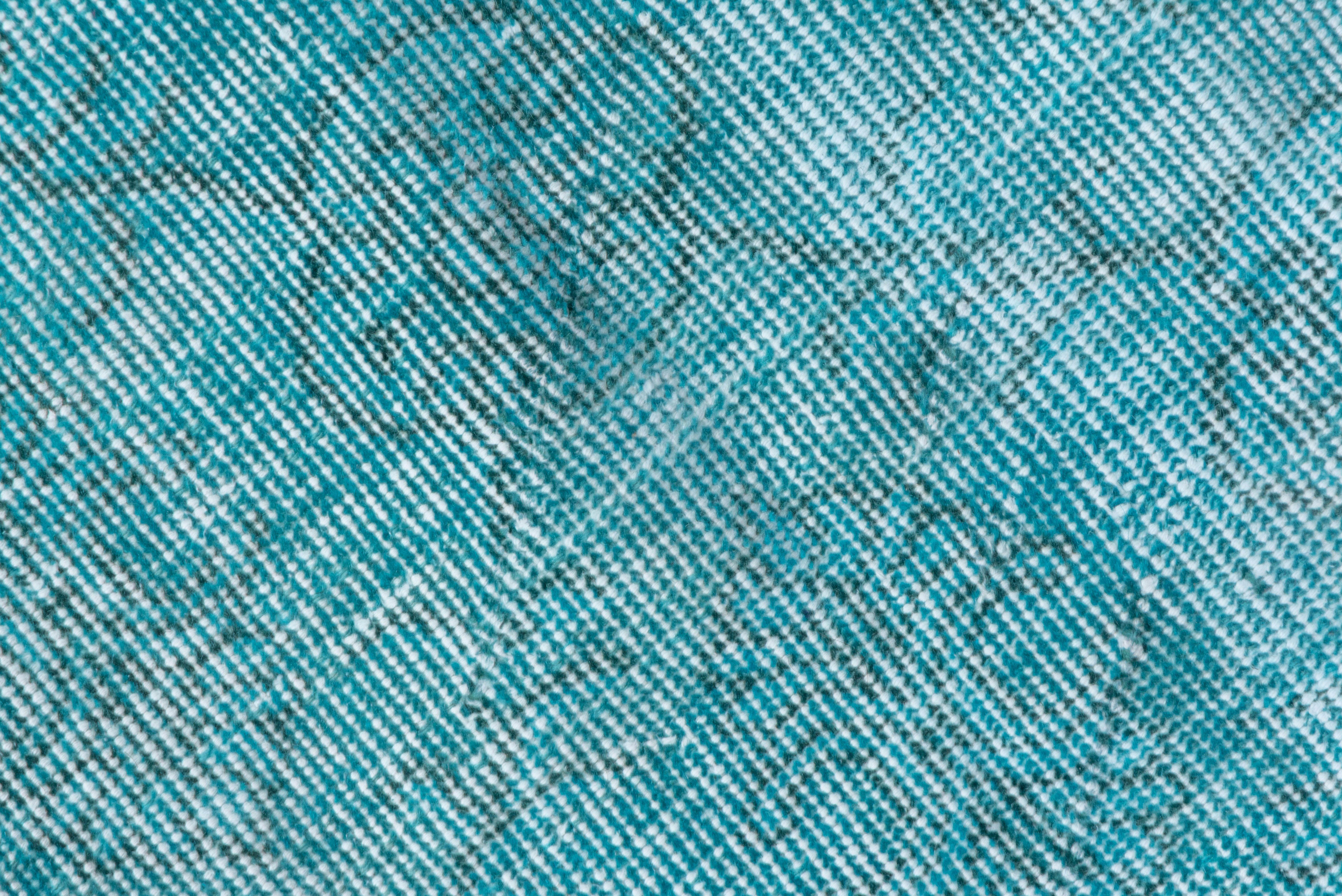 bright turquoise rug