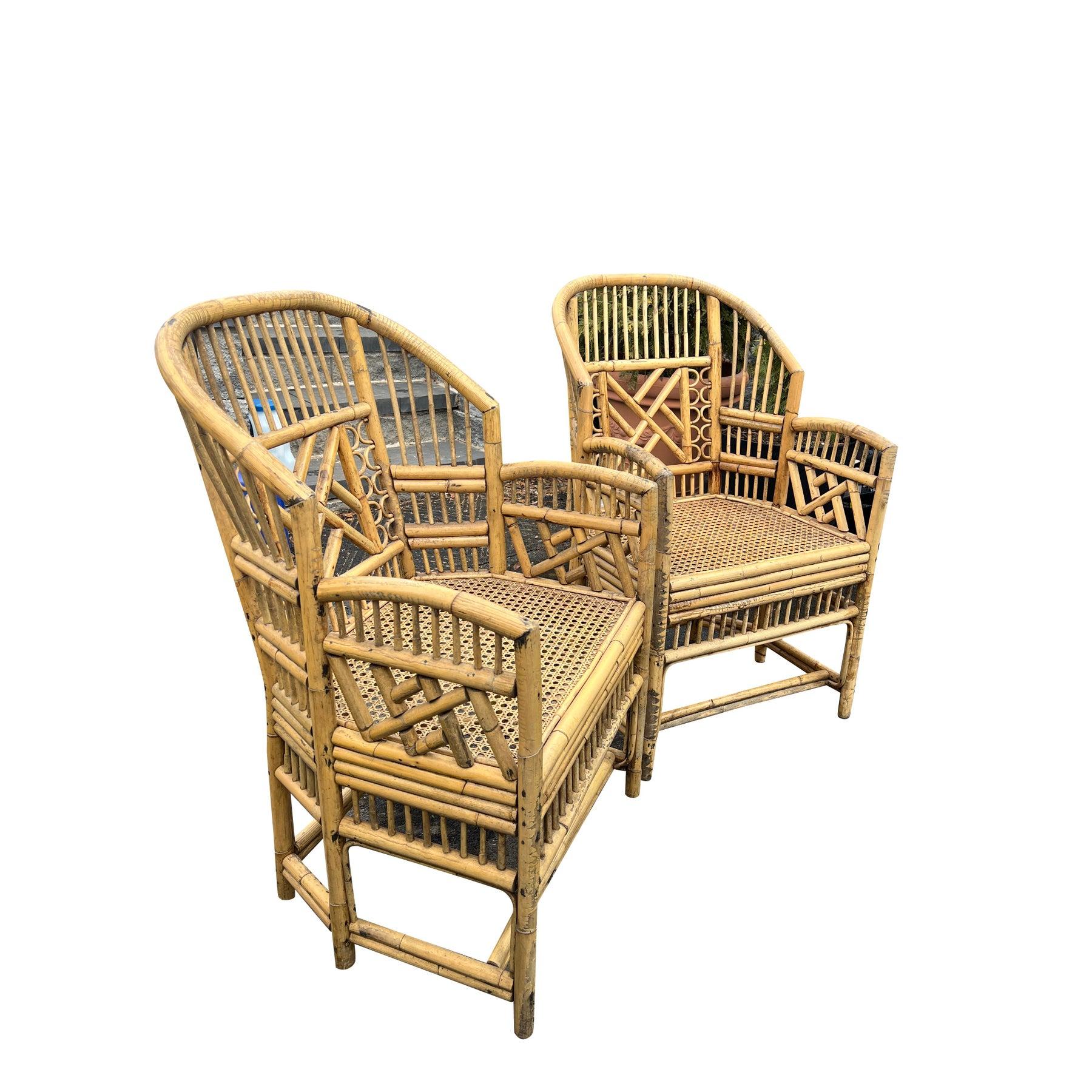Vintage Brighton Pavilion Style Bamboo and Cane Coastal Chairs - A Pair!

This pair of vintage Brighton Pavilion style chairs in bamboo and cane embodies a very popular natural wood boho chic coastal style. These clean and sturdy chairs offer a
