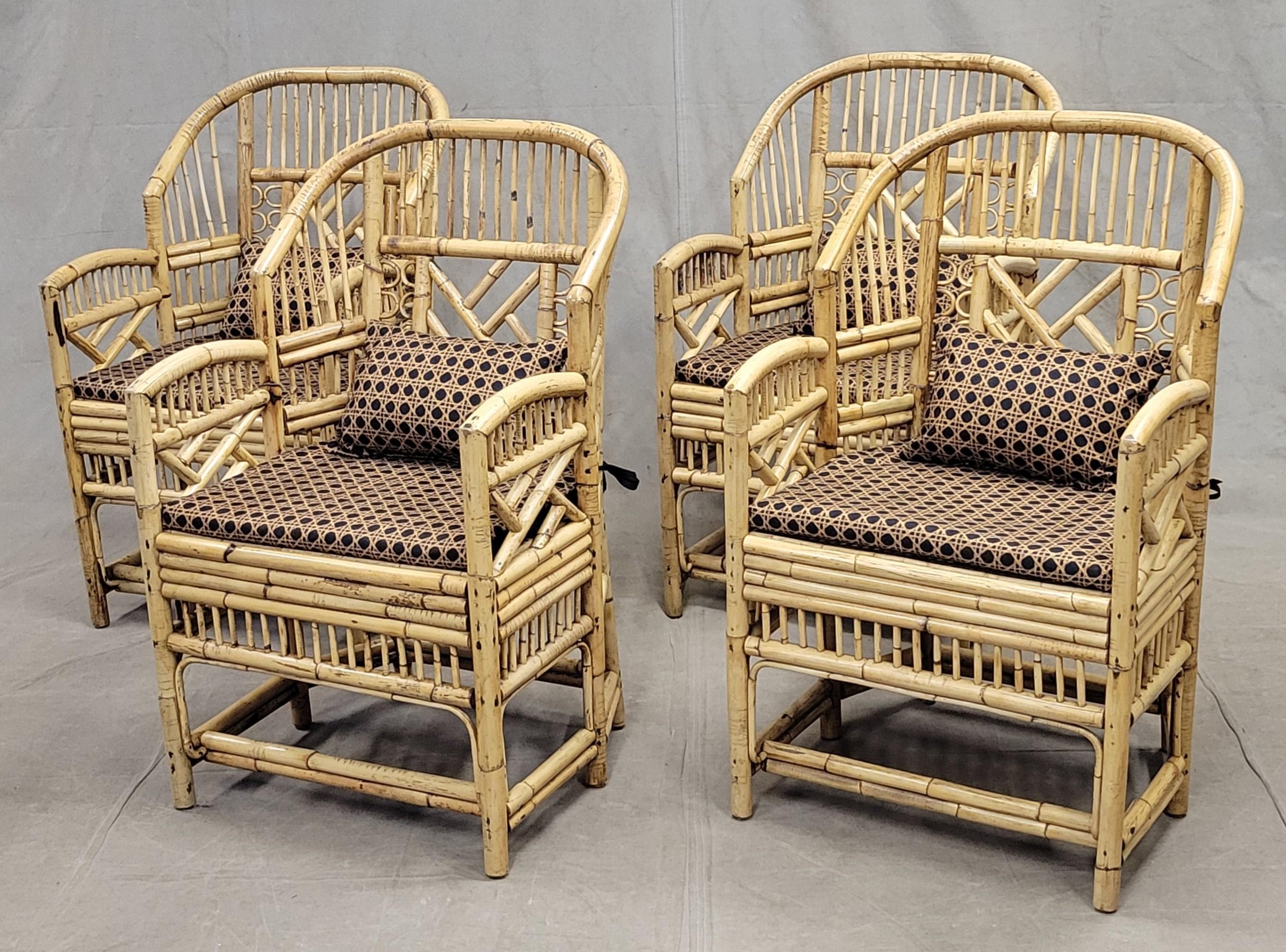 A gorgeous and classic set of four vintage Brighton Pavilion style faux bamboo and caned chairs finished off with new, custom made 100% cotton Kravet 