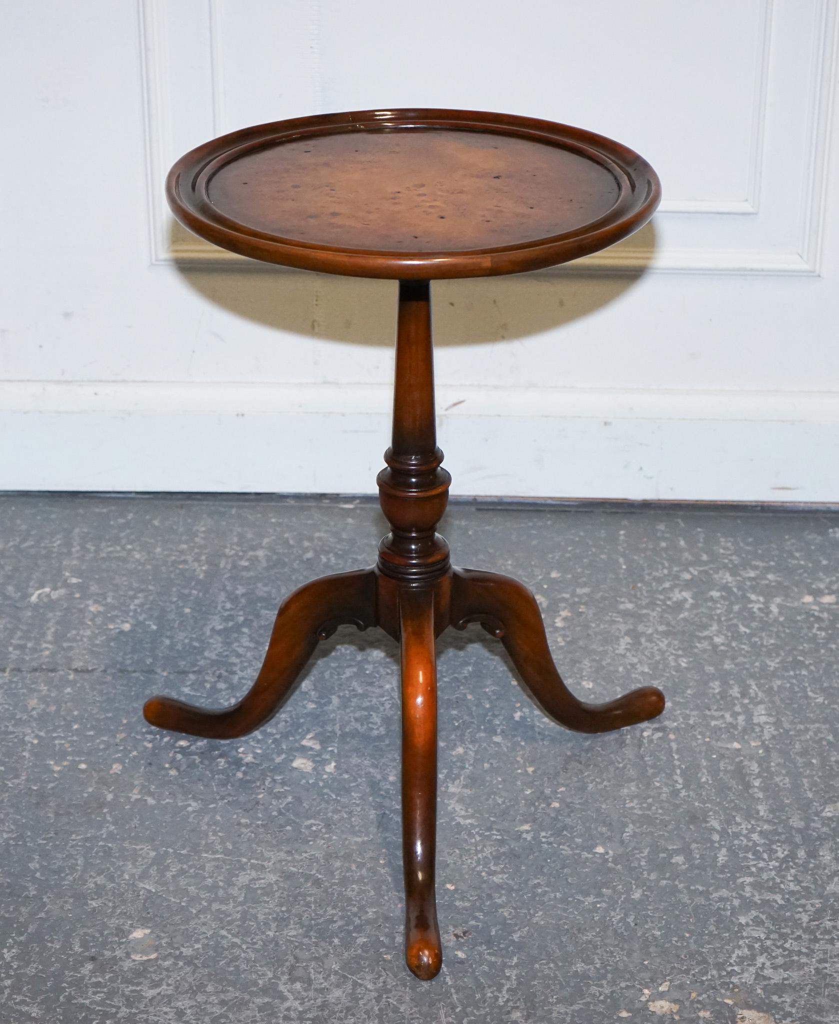 
Antiques of London

A beautiful vintage burr walnut side/end wine table by Brights of Nettlebed, renowned for producing high-quality handcrafted reproduction furniture since the 1860s. This elegant piece reflects the company’s dedication to