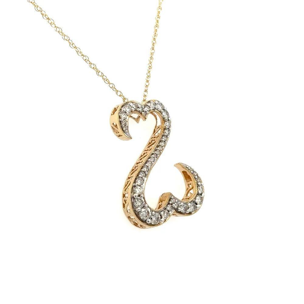 Simply Beautiful! Open Double Heart Diamond Pendant, suspended from a 14K Yellow Gold 18” chain. Hand set with 38 Round Brilliant Cut Diamonds, weighing approx. 1.00tcw. Hand crafted 14K Yellow Gold mounting. Pendant measures approx. 1.10” L x 0.80”