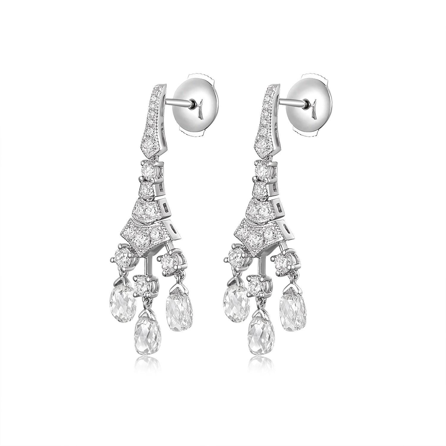 Step back in time with the elegance and allure of our antique briolette diamond dangle earrings. Delicately handcrafted in 18 karat white gold, these earrings exhibit a masterful blend of vintage design and modern craftsmanship.

Each earring