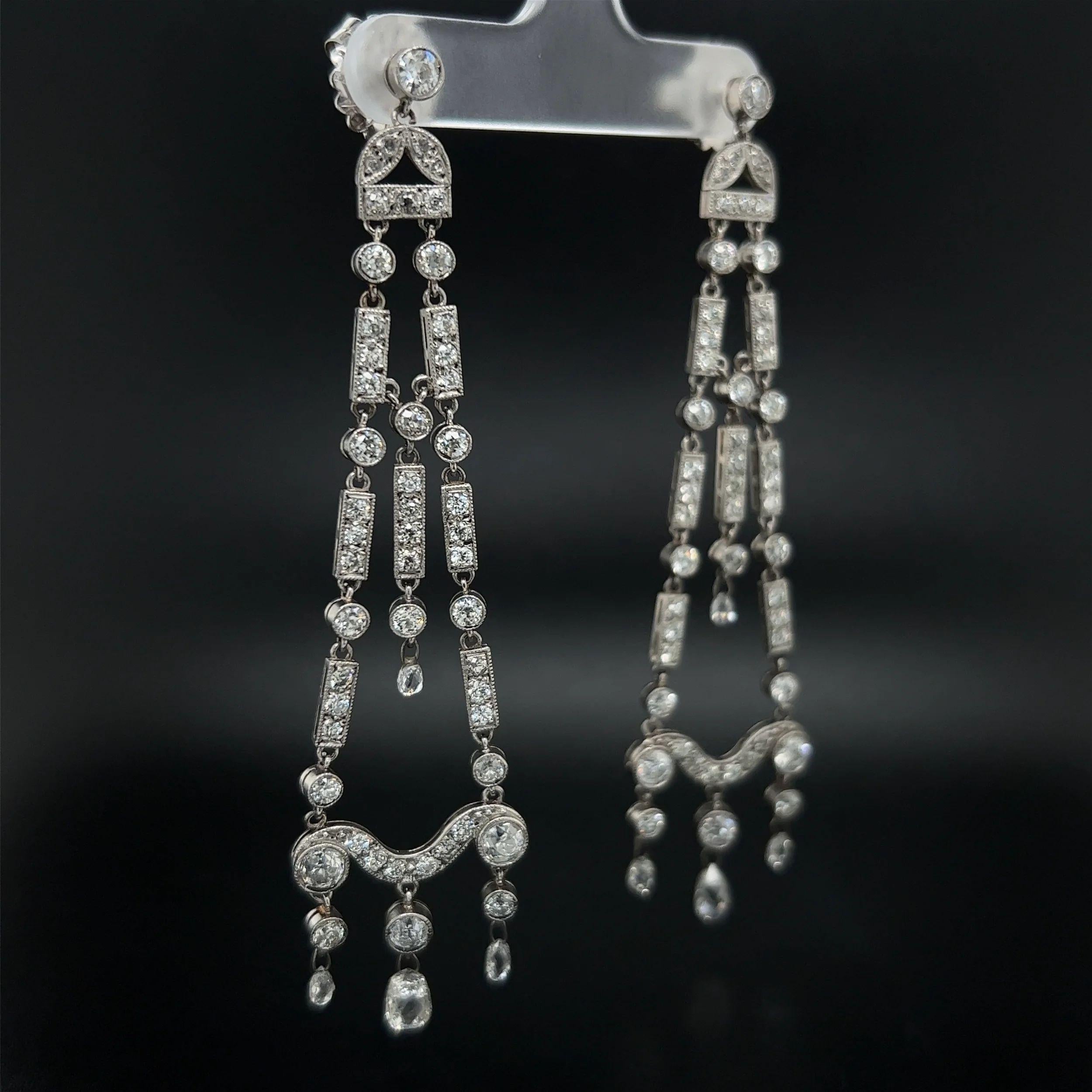 Simply Beautiful! Awesome Chandelier Diamond Platinum Drop Earrings. Hand set with 1.60tcw Briolette Diamonds and 5.08tcw Round Old European Cut Diamonds. Beautifully Hand crafted in Platinum. Earrings measure approx. 3” long x 0.76” wide. More