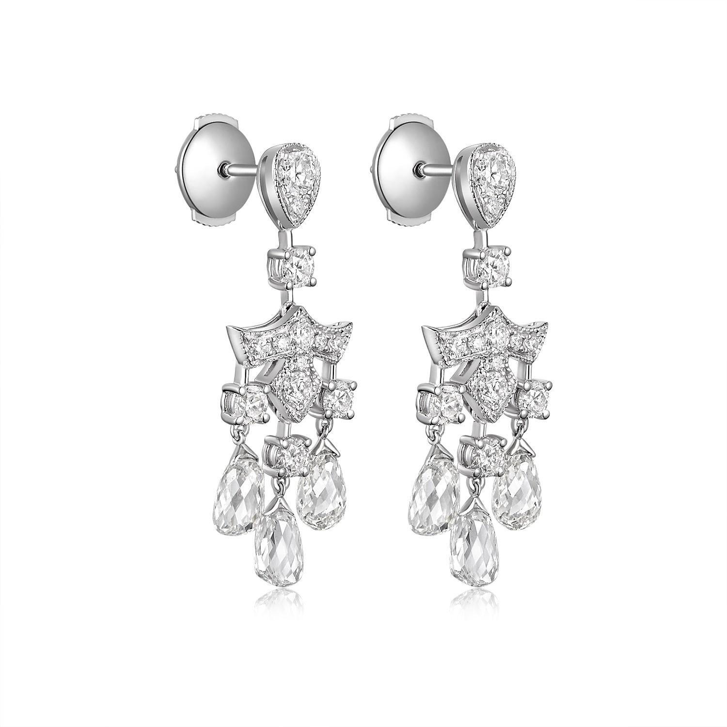 Experience the elegance of timeless design with these captivating earrings, a true testament to fine craftsmanship and luxury. The highlight of these earrings is the six briolette diamonds weighing a total of 3.46 carat, poised gracefully at the