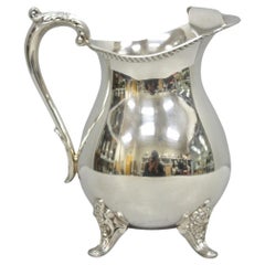 Vintage Bristol by Poole Silver Plated Bulbous Footed Ice Lip Water Pitcher Vintage Bristol by Poole Silver Plated Bulbous Footed Ice Lip Water Pitcher