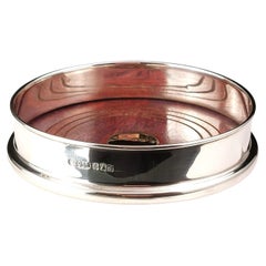 Vintage Britannia silver and 9k gold wine coaster, bottle stand