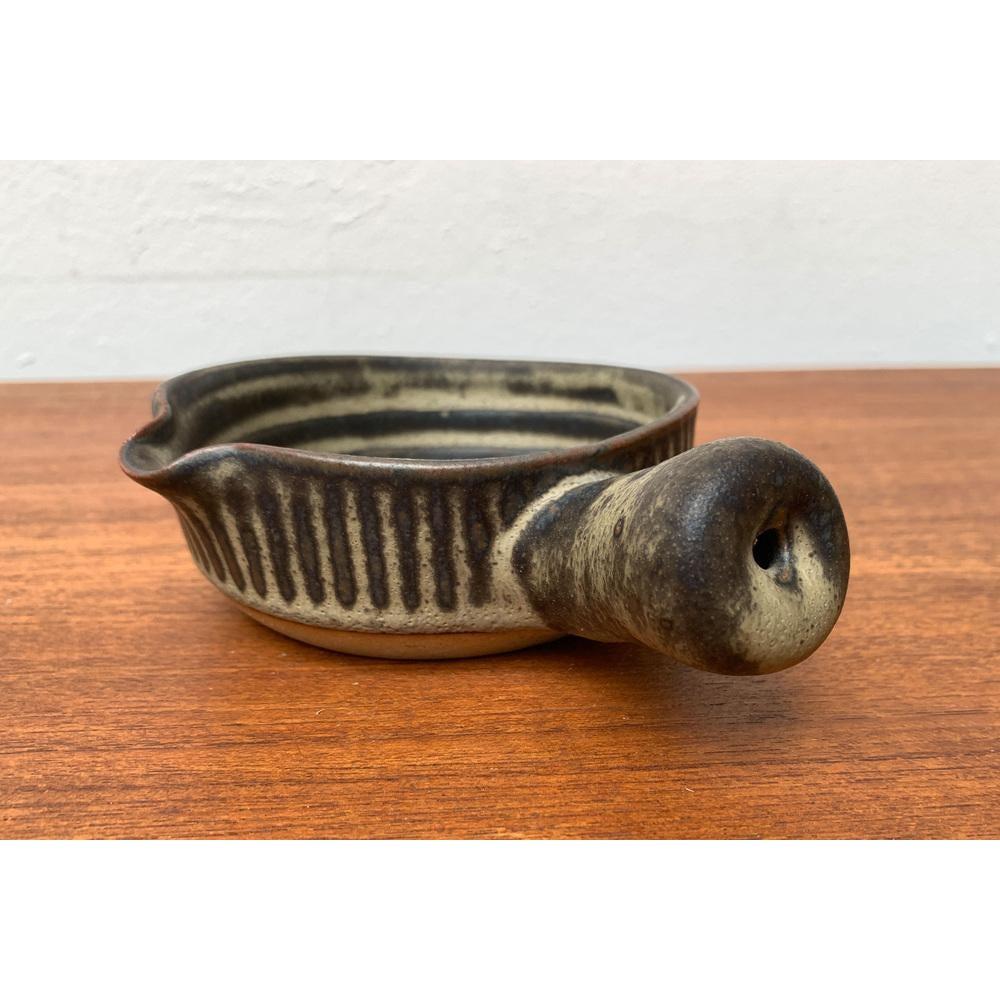 Vintage British Brutalist Bowl in Ceramic from Tremar UK, in Very Good conditions. Designed 1970 to 1979 This piece has an attribution mark.

Additional information:
Materials: Ceramic
Color: Beige
Styles: Brutalist
Country of Origin: United
