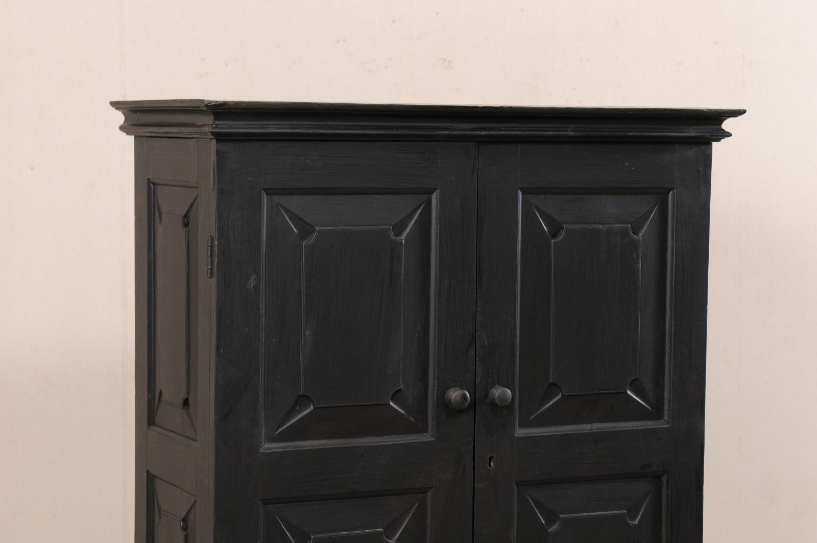 Vintage British Colonial Raised Black Colored Cabinet, Mid-20th Century In Good Condition In Atlanta, GA