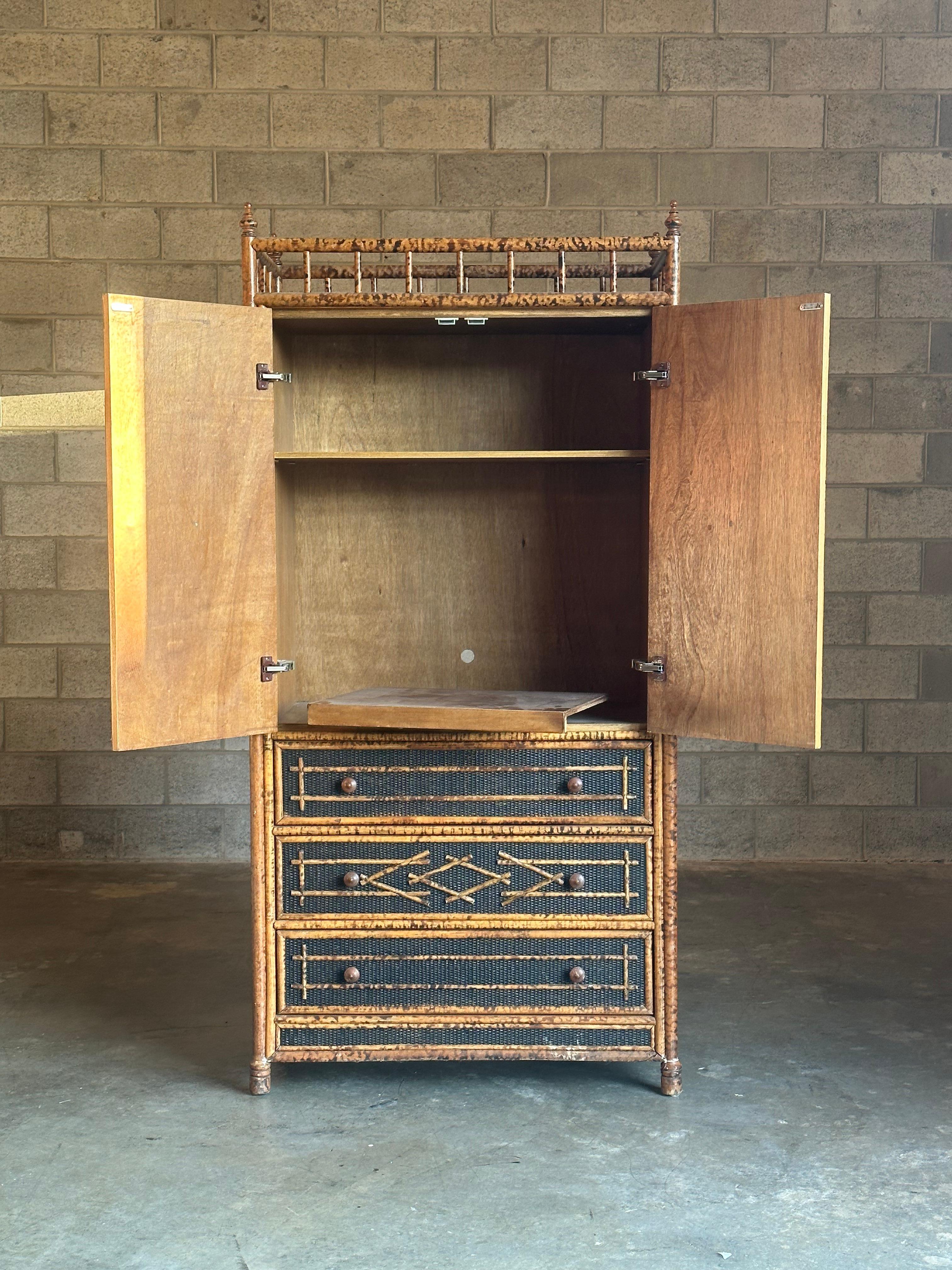 Vintage British Colonial Style Faux Bamboo and Cane Armoire In Good Condition In St.Petersburg, FL