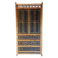Vintage British Colonial Style Faux Bamboo and Cane Armoire