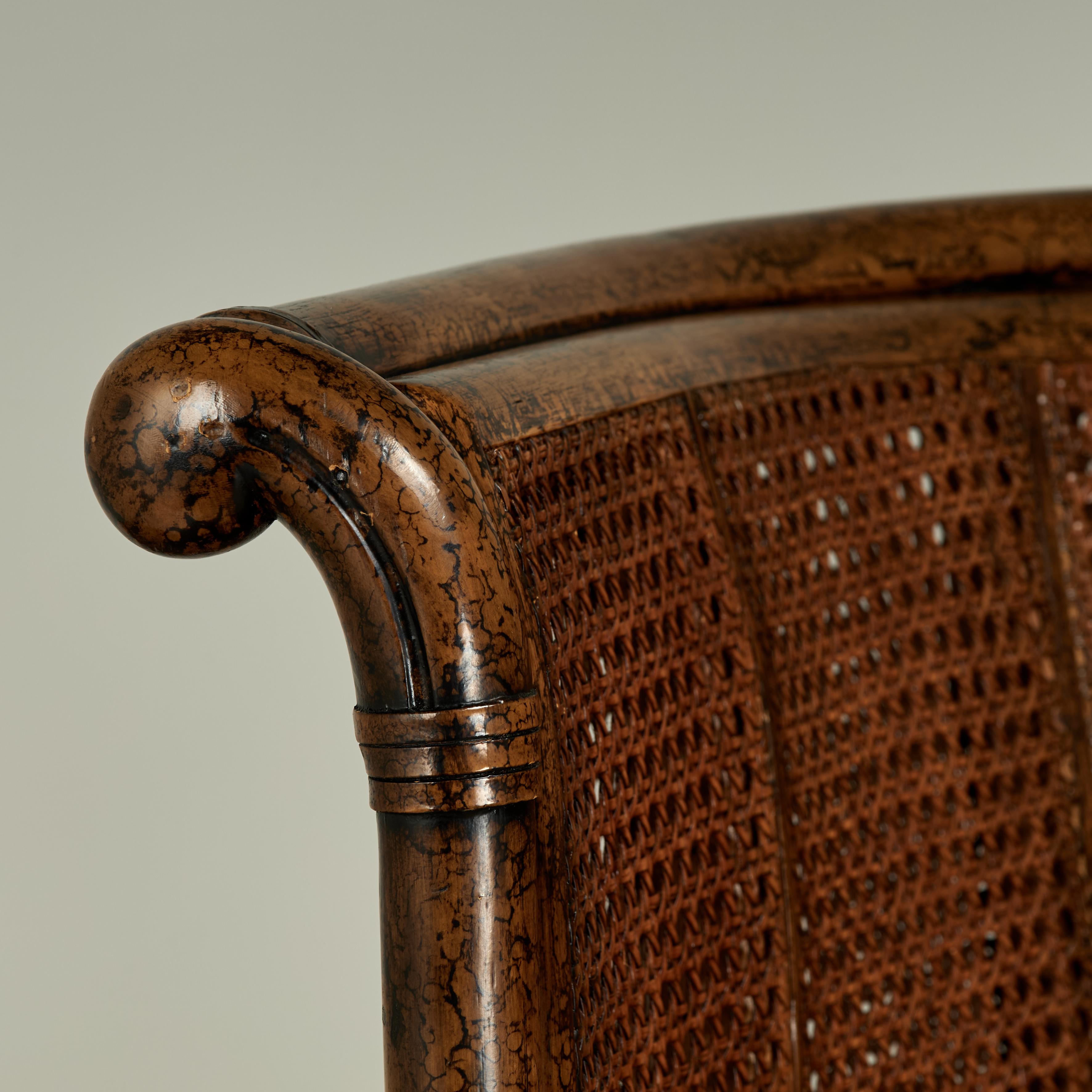 Philippine Vintage British Colonial Style Faux Tortoise Caned Wingback For Sale