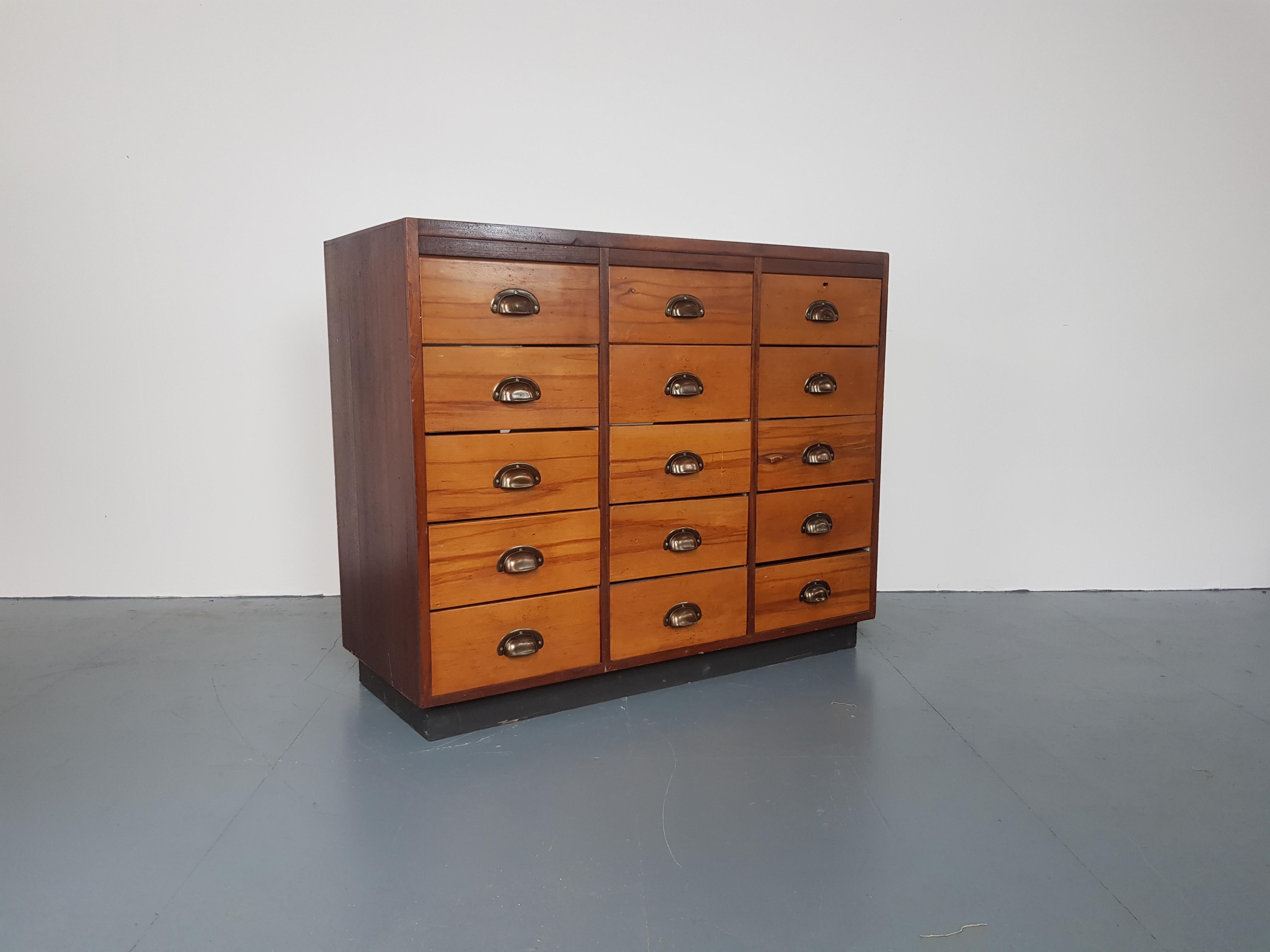 Nice vintage teak and mahogany shop counter. This is an unusual piece firstly because of the distinctive two tone wood, and also because it is handily much shallower than most shop counters of this type.

Measure: Width 113 cm

Depth 48