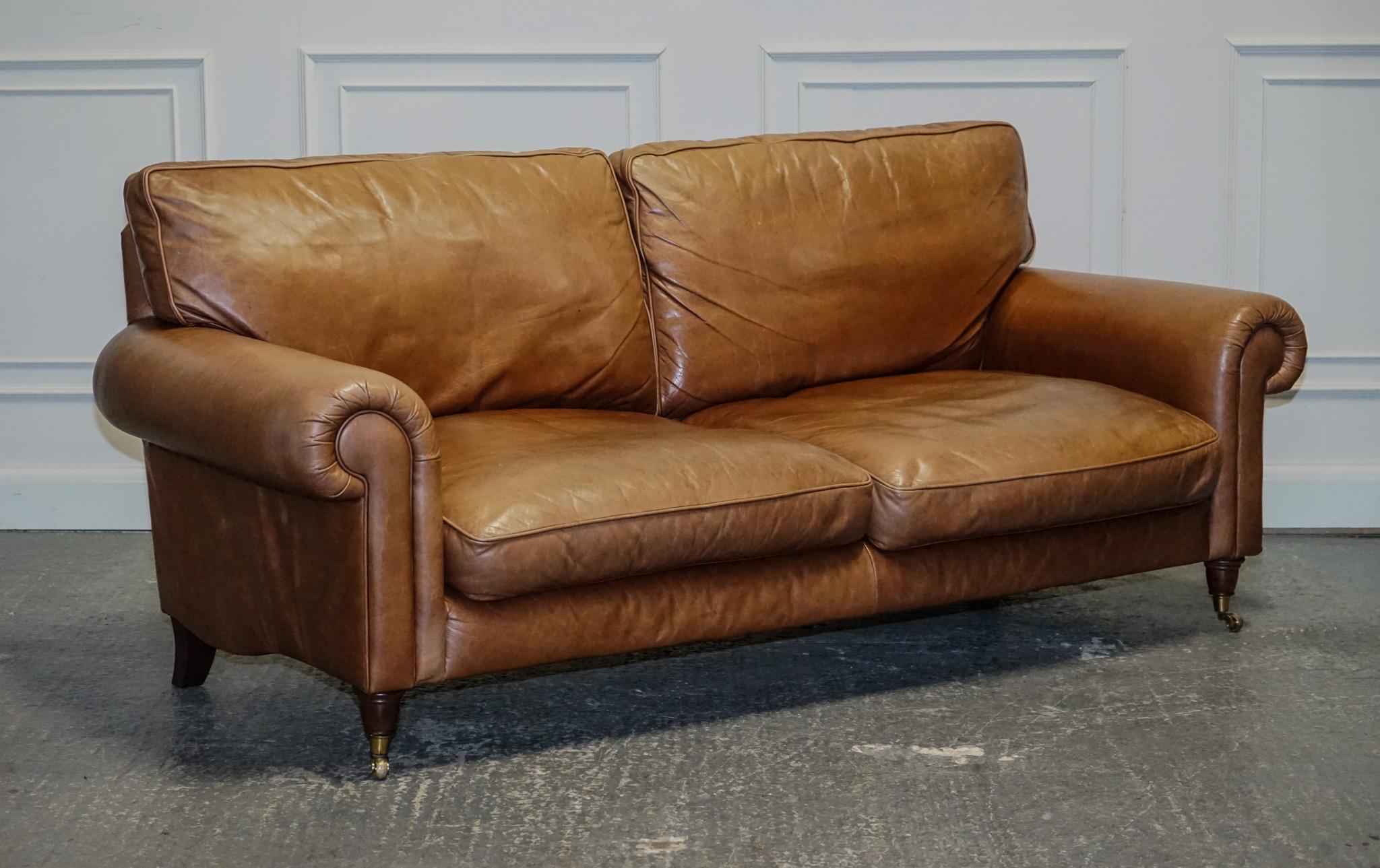 
We are delighted to offer for sale this Stunning Laura Ashley Leather Sofa With Castor Feet.

The sofa is in a very condition, however it does have a few marks here and there specially you will see it on the seat cushions. This does not affect its