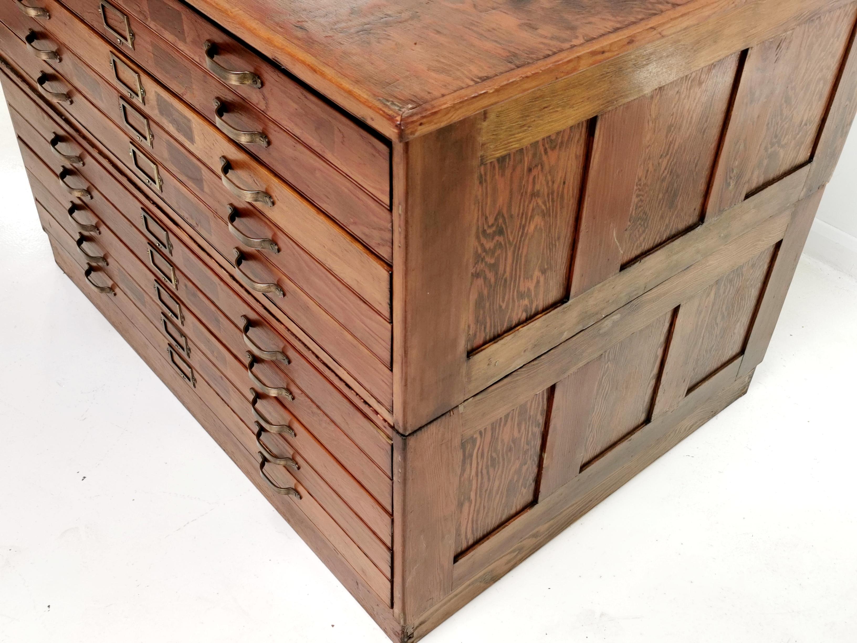 Plan chest

British made plan chest from the early 20th century.
The ten generous drawers split into two units to enable you to move around comfortably. 
Drawers all slide freely. 

Dimensions (cm): 
91 D x 90 H x 125 W 

Condition: