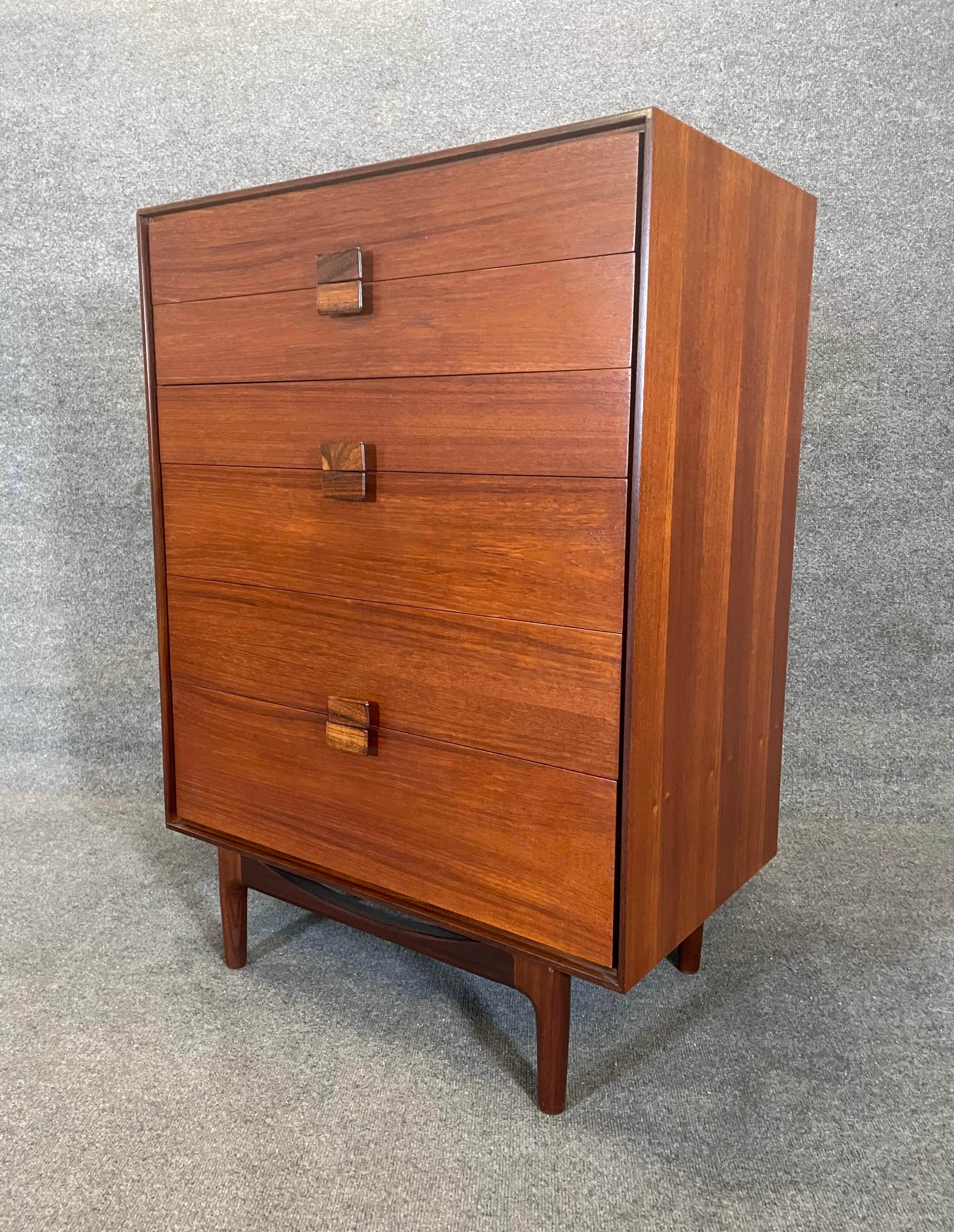 Here is a beautiful British mid century modern teak dresser designed by Ib Kofod Larsen and manufactured by G Plan in England in the 1960's.
This exquisite case piece, recently imported from Europe to California before its refinishing, features a