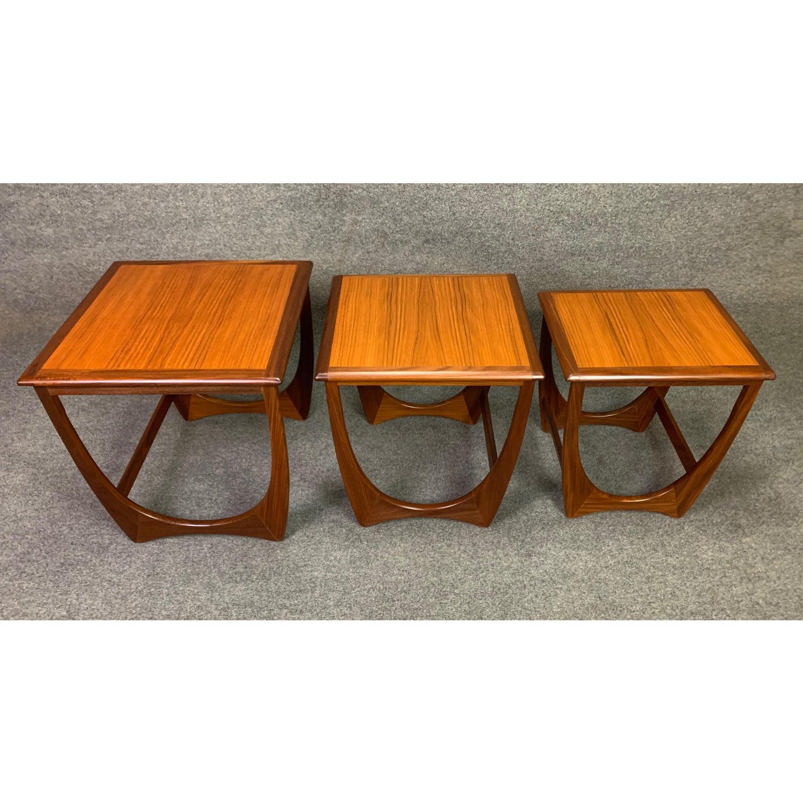 Here is an exquisite Mid-Century Modern set of nesting tables in teak part of the acclaimed 