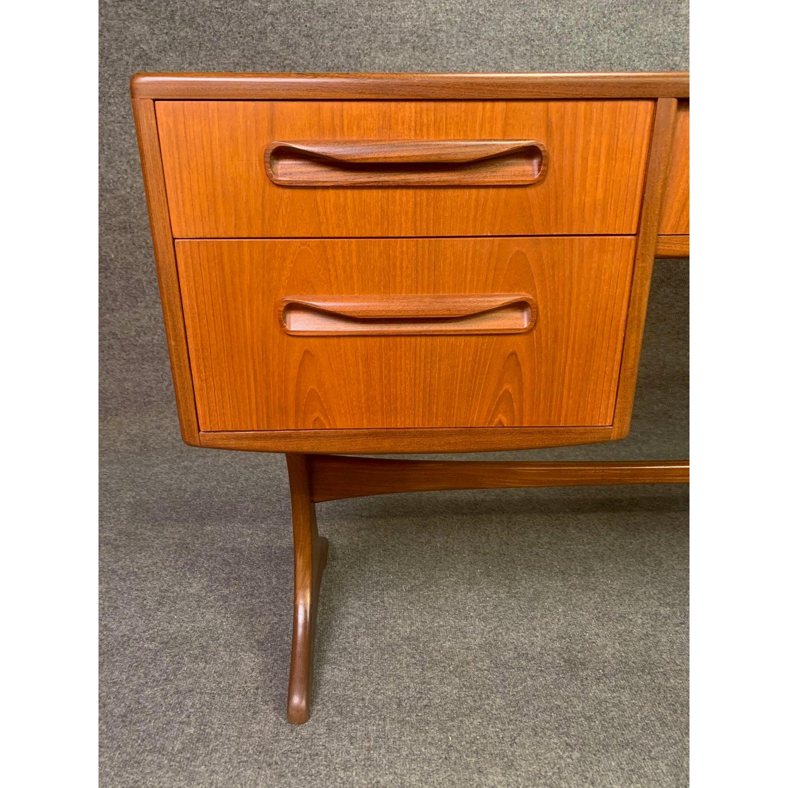 Here is a beautiful and rare British Mid-Century Modern work table part of the acclaimed 