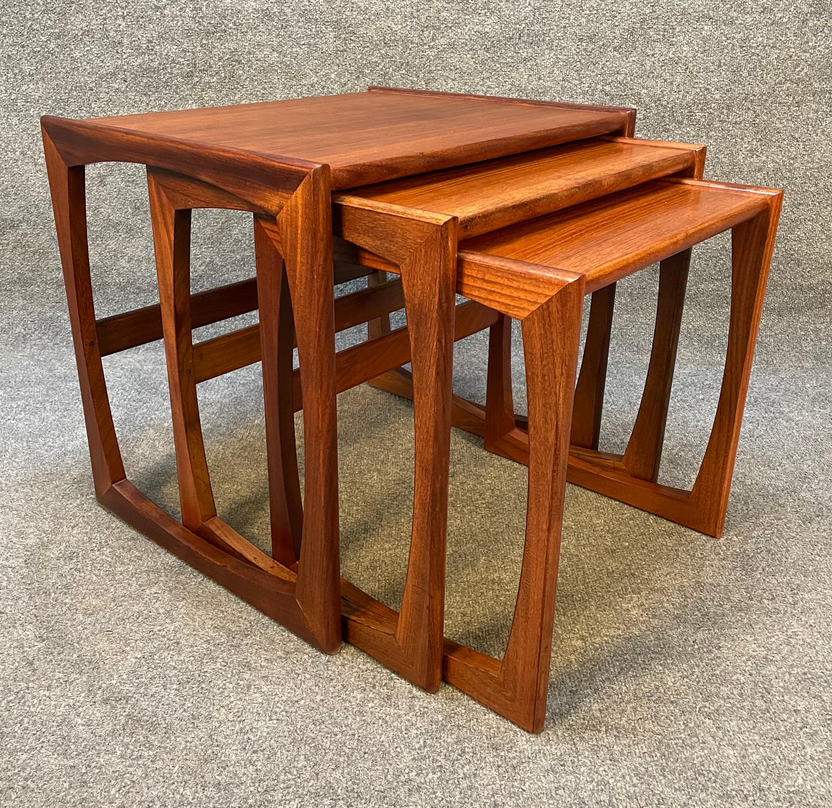 Here is a beautiful set of three beautiful Mid-Century Modern nesting tables in teak wood designed by R. Bennett and manufactured by G Plan in UK in the 1960's.
These tables, recently imported from England to California before their refinishing,