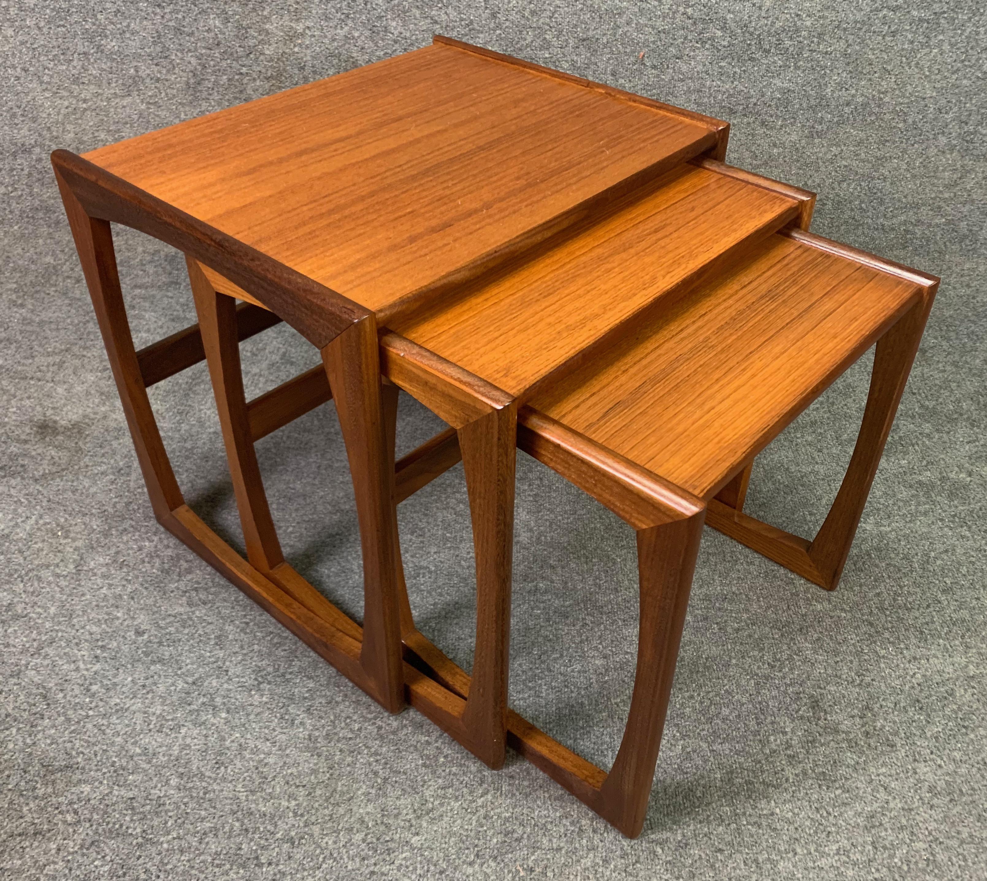 Here is a beautiful set of three nesting tables in teak designed by R. Bennett for the 