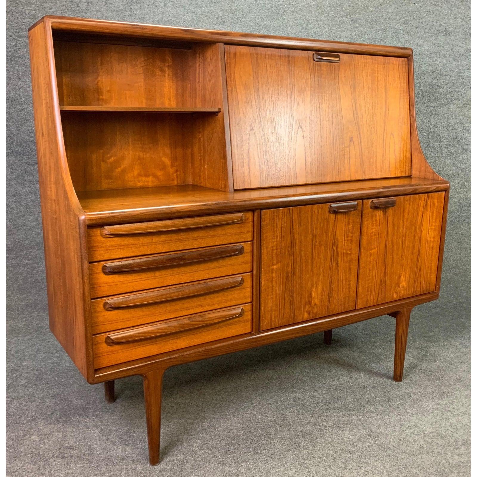 Here is a beautiful Mid-Century Modern secretary desk in teak part of the 