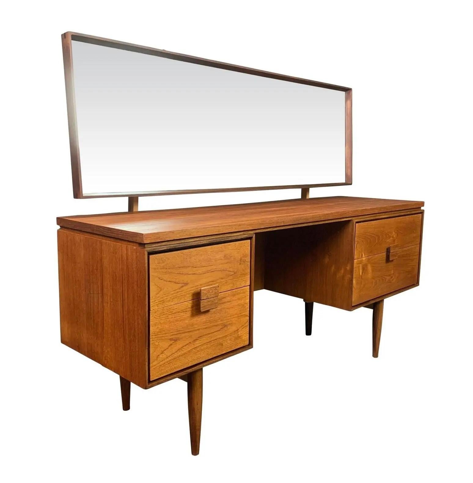 Here is from master Ib Kofod Larsen a beautiful teak vanity from the the acclaimed 