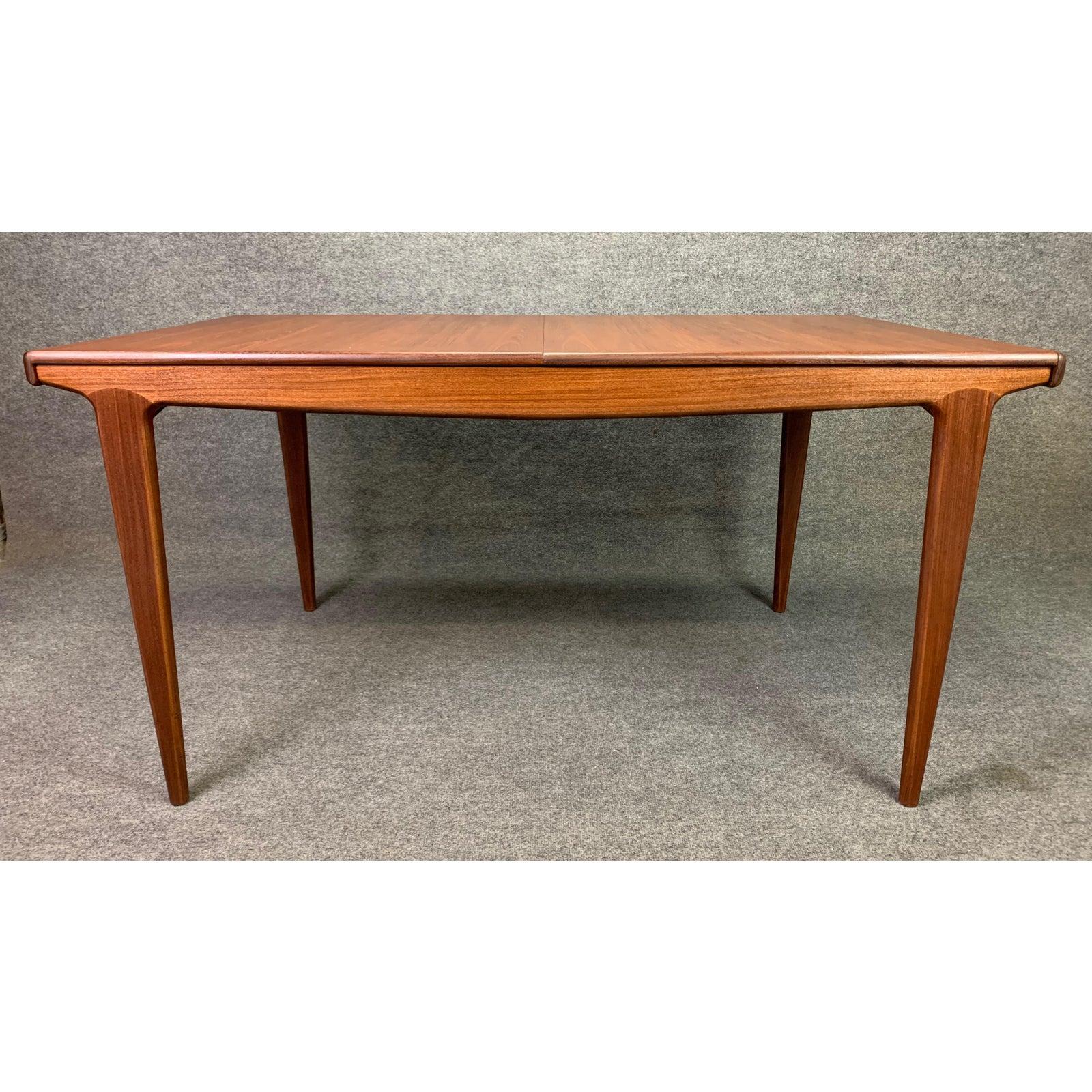 Here is an exclusive British Mid-Century Modern dining table designed by John Herbert and manufactured by A. Younger Ltd in Scotland in the 1960s.
This beautiful table, recently imported from UK to California before its restoration, features a