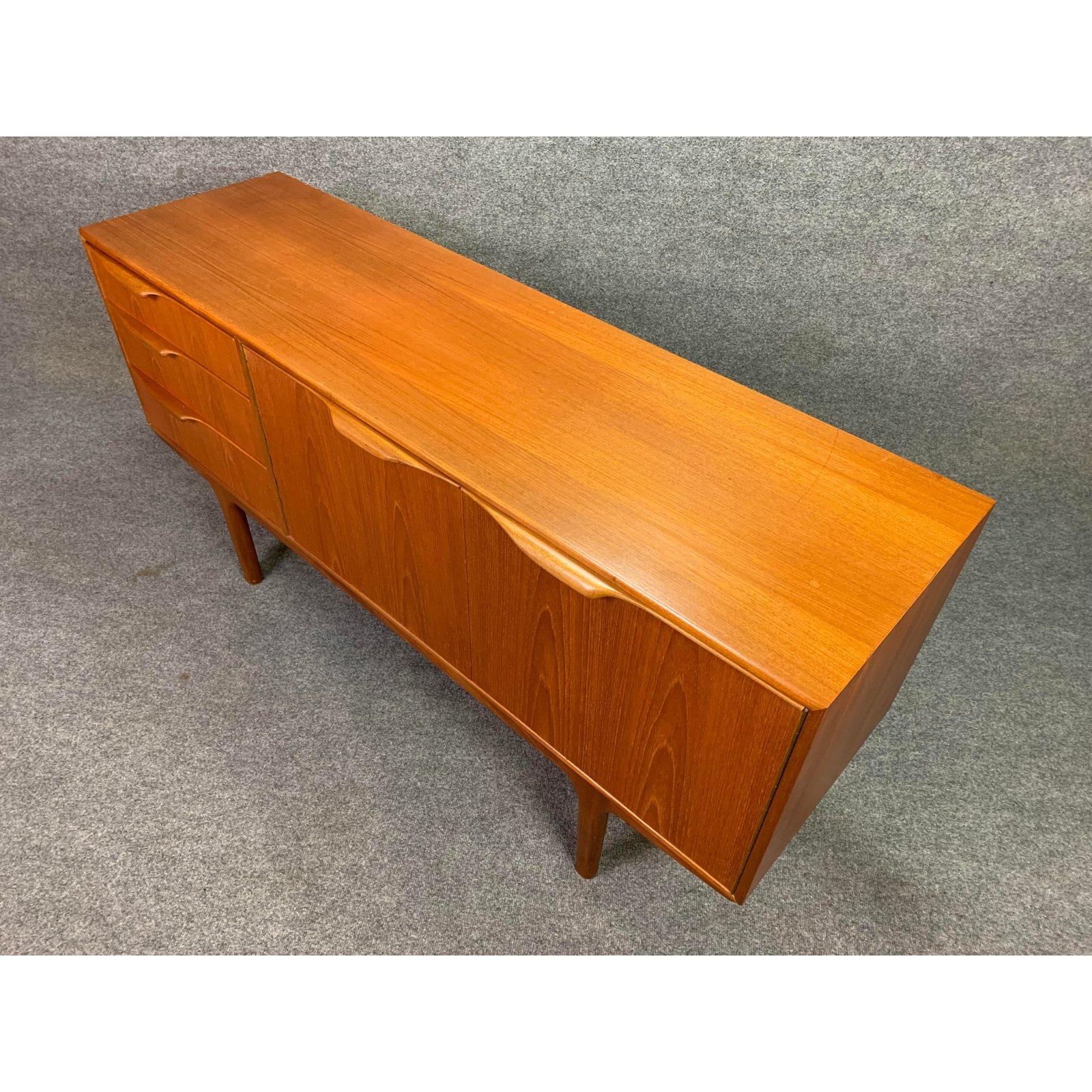 Here is a beautiful British mid century modern compact credenza model 