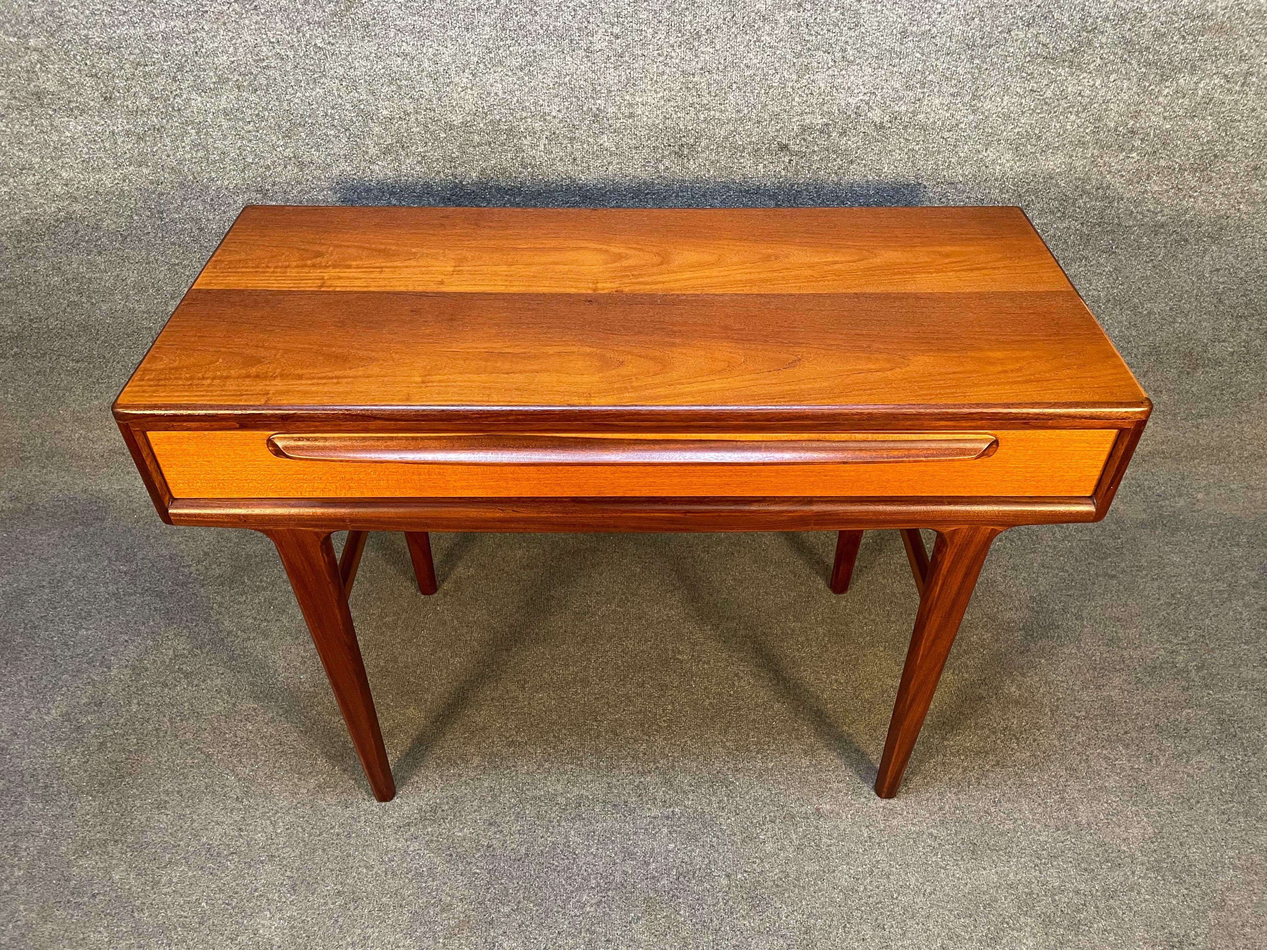 Here is a beautiful British Mid-Century Modern teak entry way console table from the 