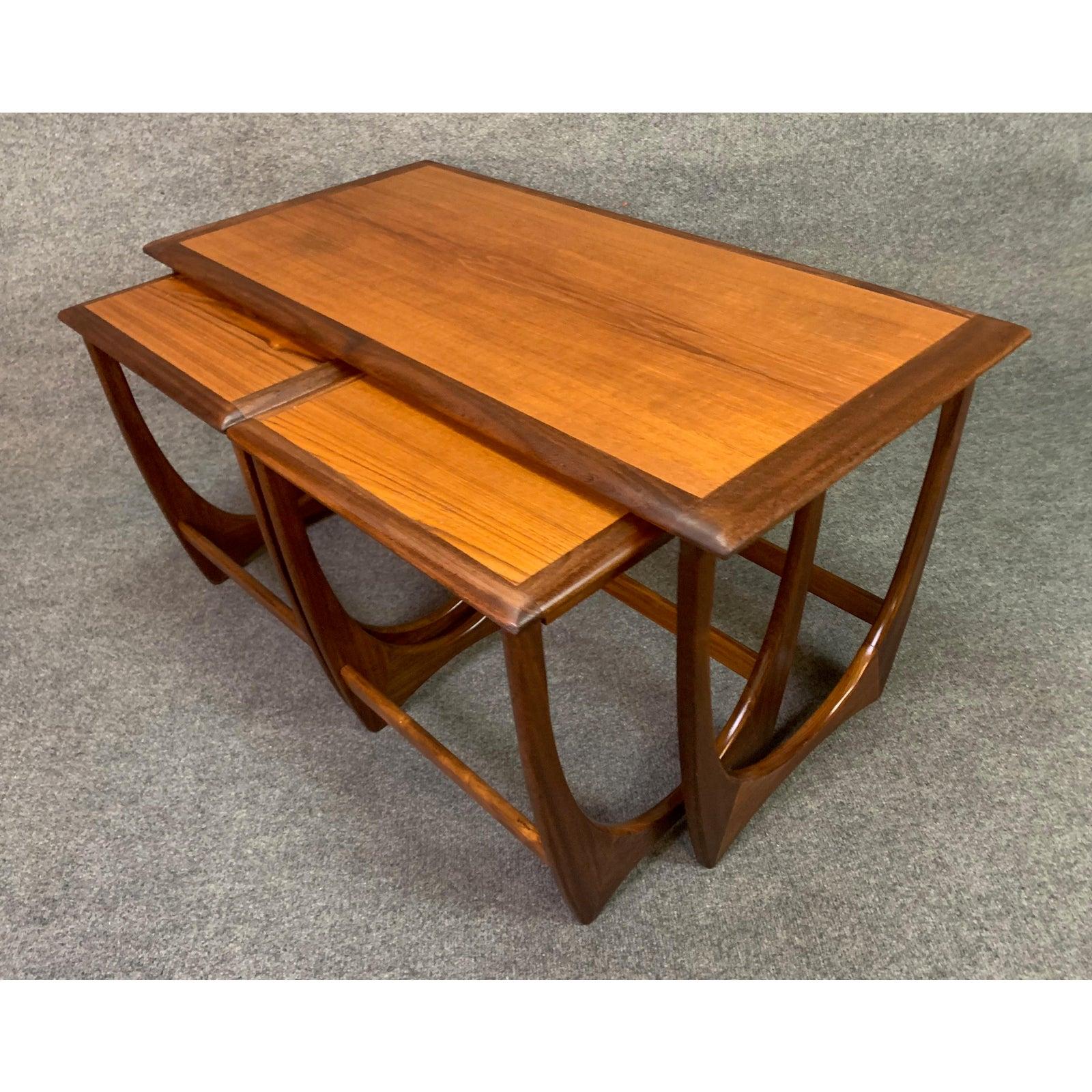 Here is a rare Mid-Century Modern set of coffee and nesting tables in teak part of the acclaimed 