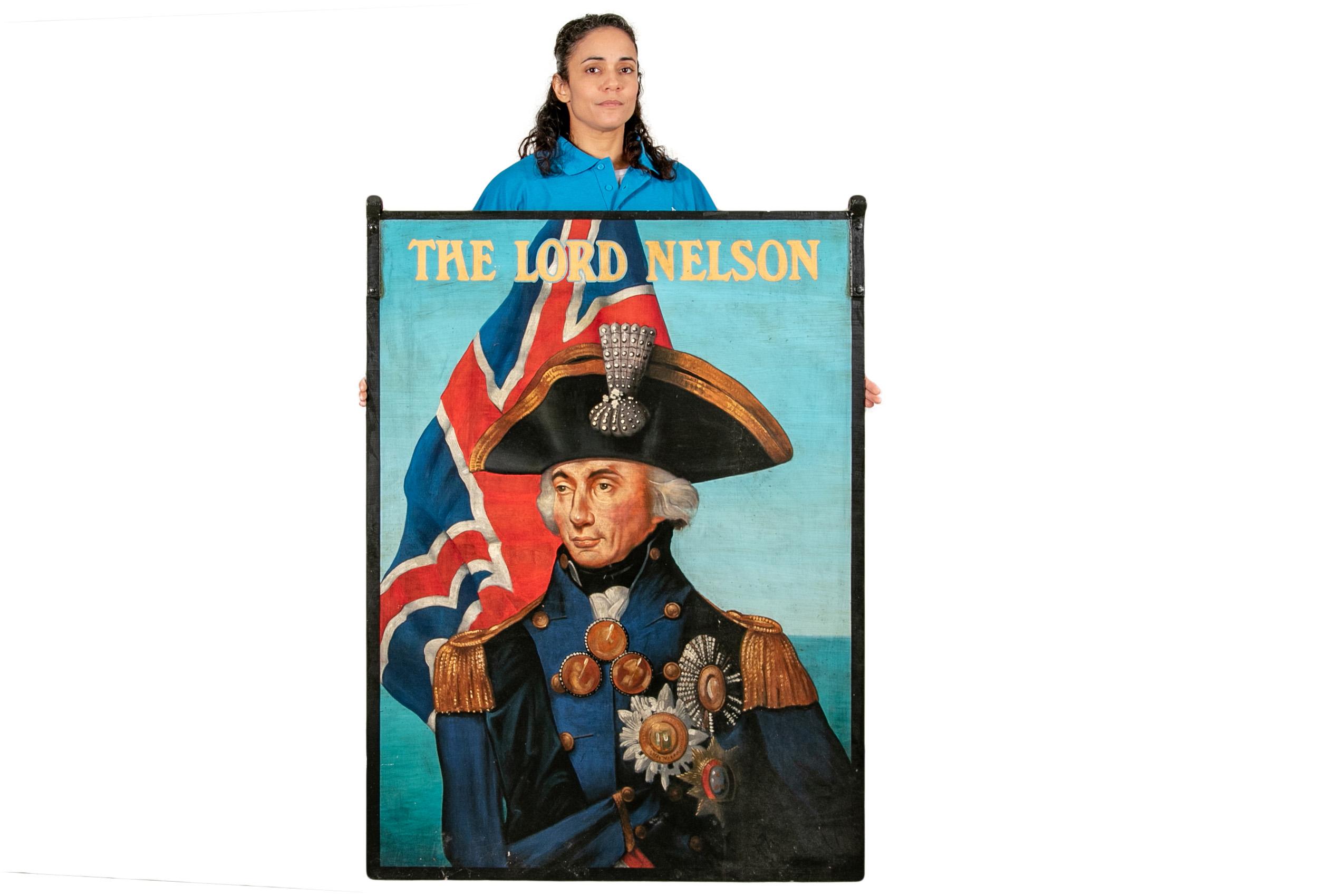 Heavy painted iron with loops on the top ends for suspension. Vibrant color, excellent images and great weight.
One side painted with the image of Admiral Lord Nelson in the uniform he wore at the Battle of Trafalgar, on a blue background.
The