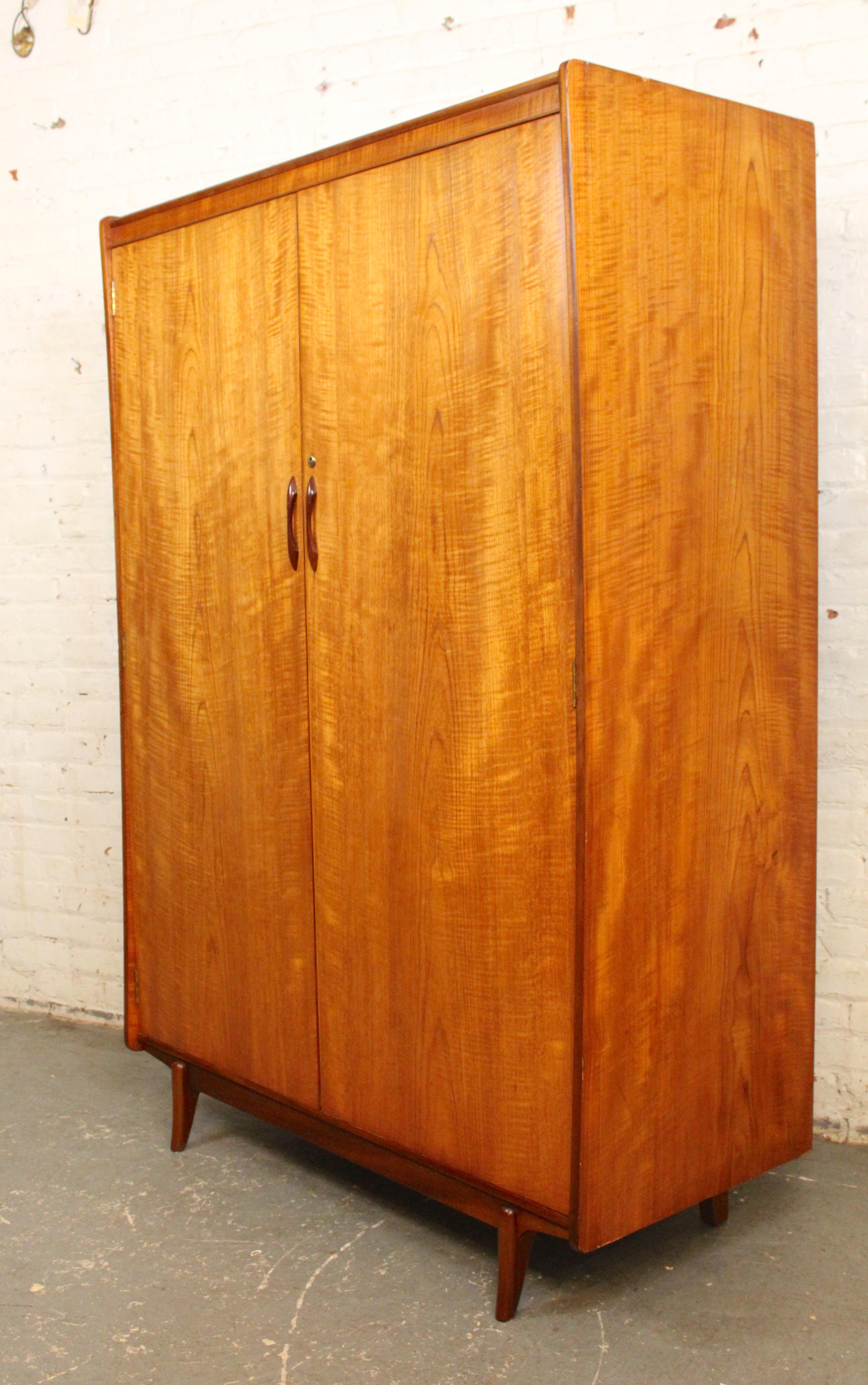 This two door wardrobe stands over five feet tall with ample open space to house your hanging clothes. Fitted with two hanging bars, plus top shelf storage. Skeleton key is included.
Please confirm location NY or NJ