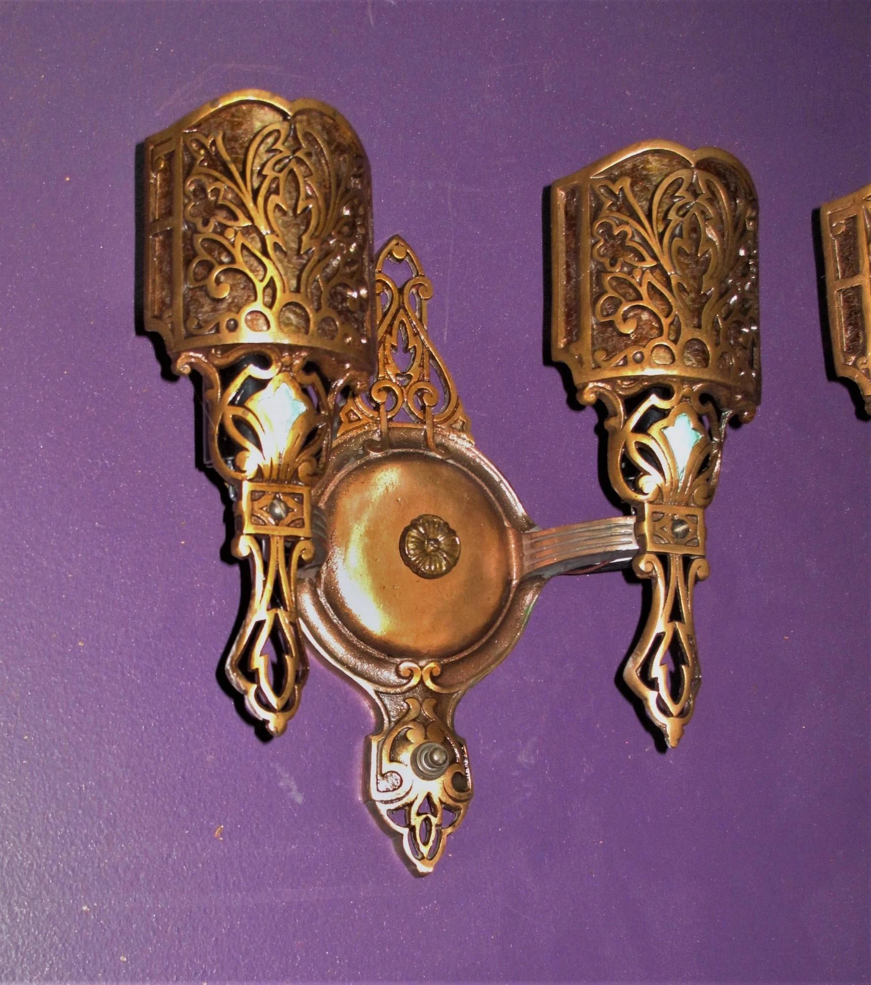 20th Century Vintage Bronze 2 Bulb Sconce Lights w/ Mica. 4 pair available. priced per pair For Sale