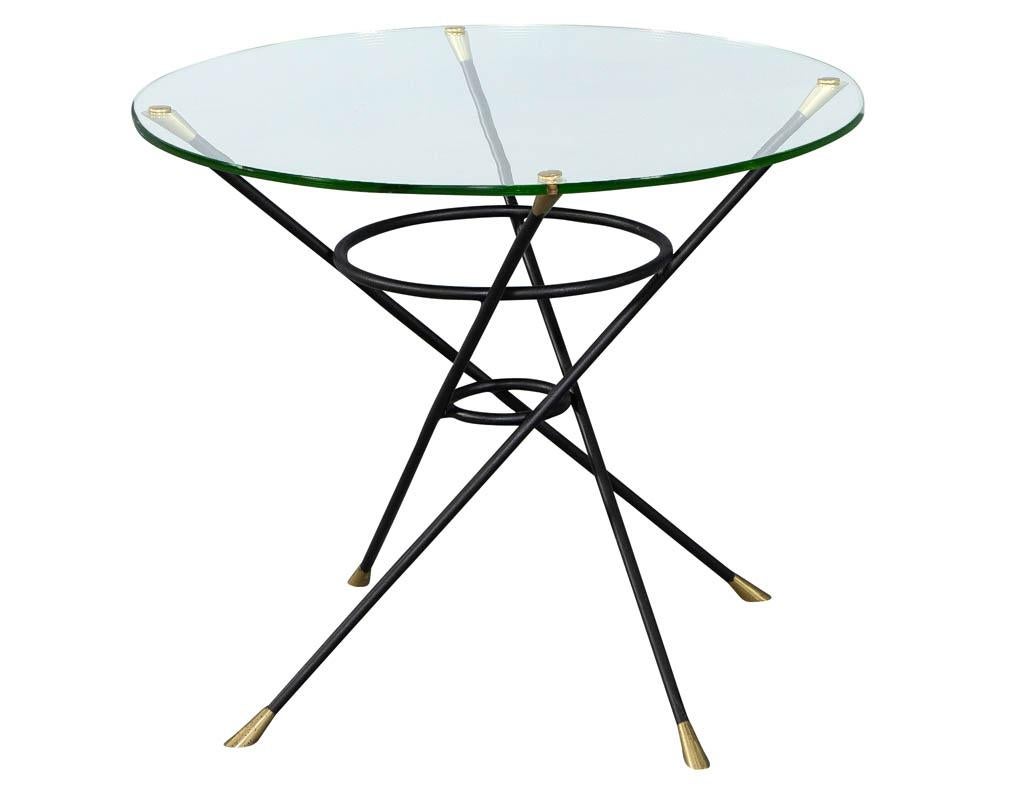 Vintage bronze and brass cyclone base round glass modern side table.

Price includes complimentary curb side delivery to the continental USA.