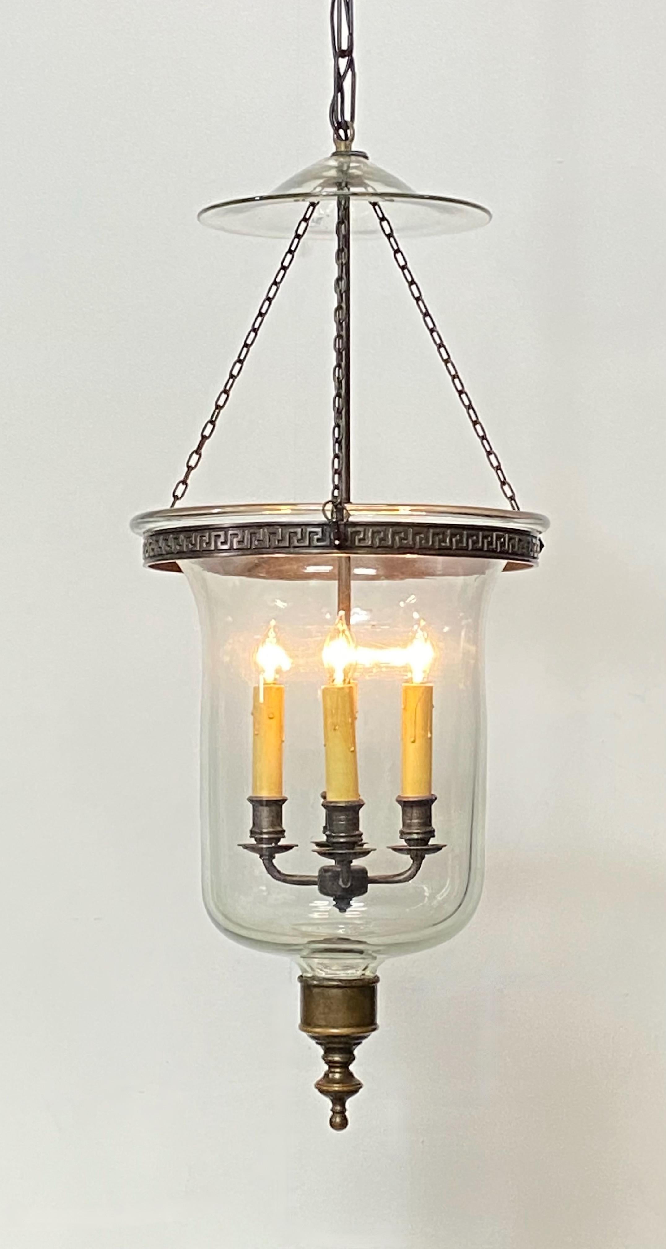 A very good quality patinated bronze and clear glass hurricane hanging lantern.
Recently re-wired and ready to install.
The length of the chain can be extended or reduced to buyers specifications at a negligible extra charge.

 