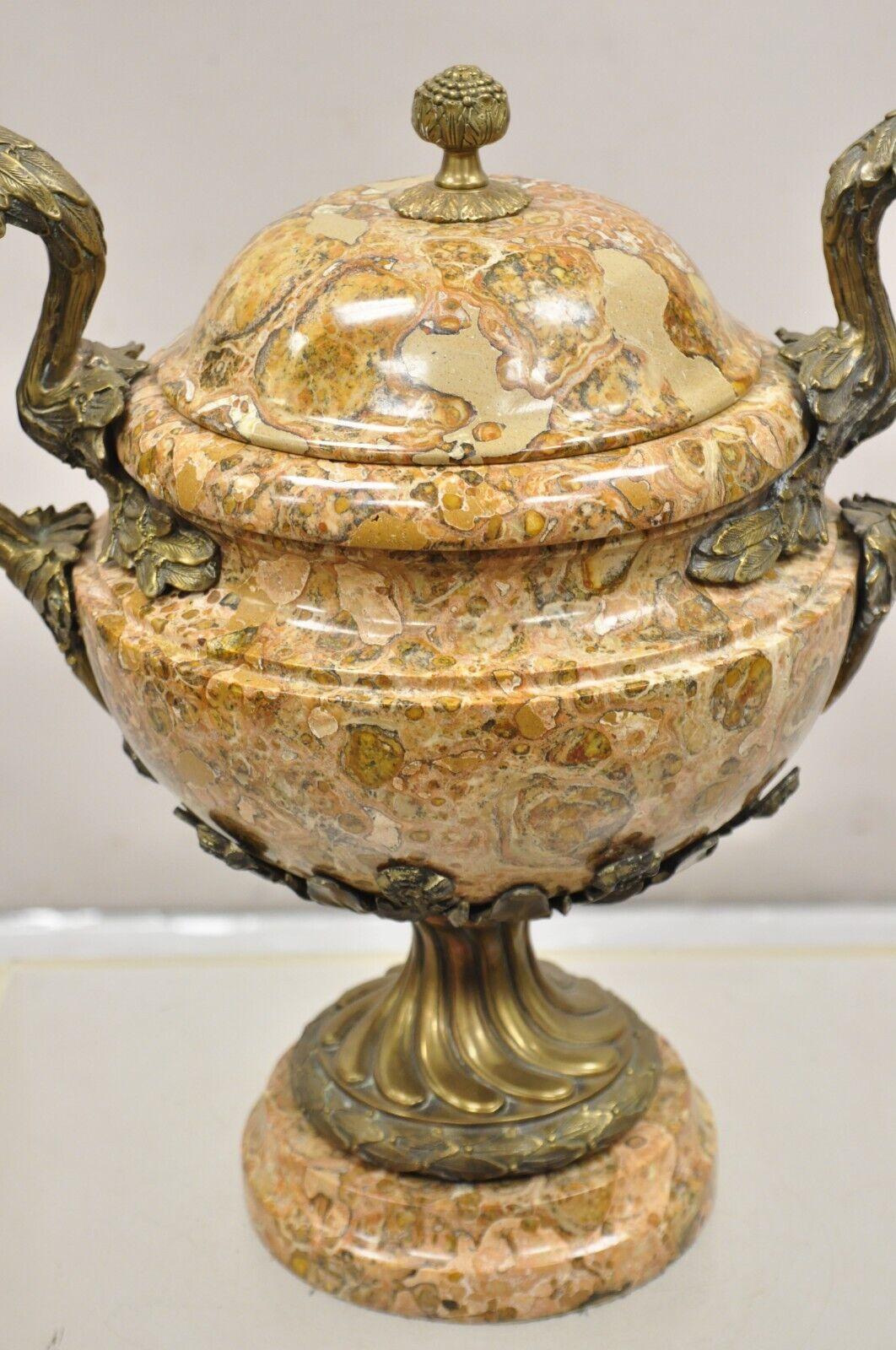 Vintage Bronze and Marble French Baroque Style Lidded Urn Centerpiece Cassolette. Item features Heavy marble and bronze construction, scrolling leafy arms, removable lid, very nice centerpiece. Approx. 40 lbs. Circa Late 20th Century. Measurements: