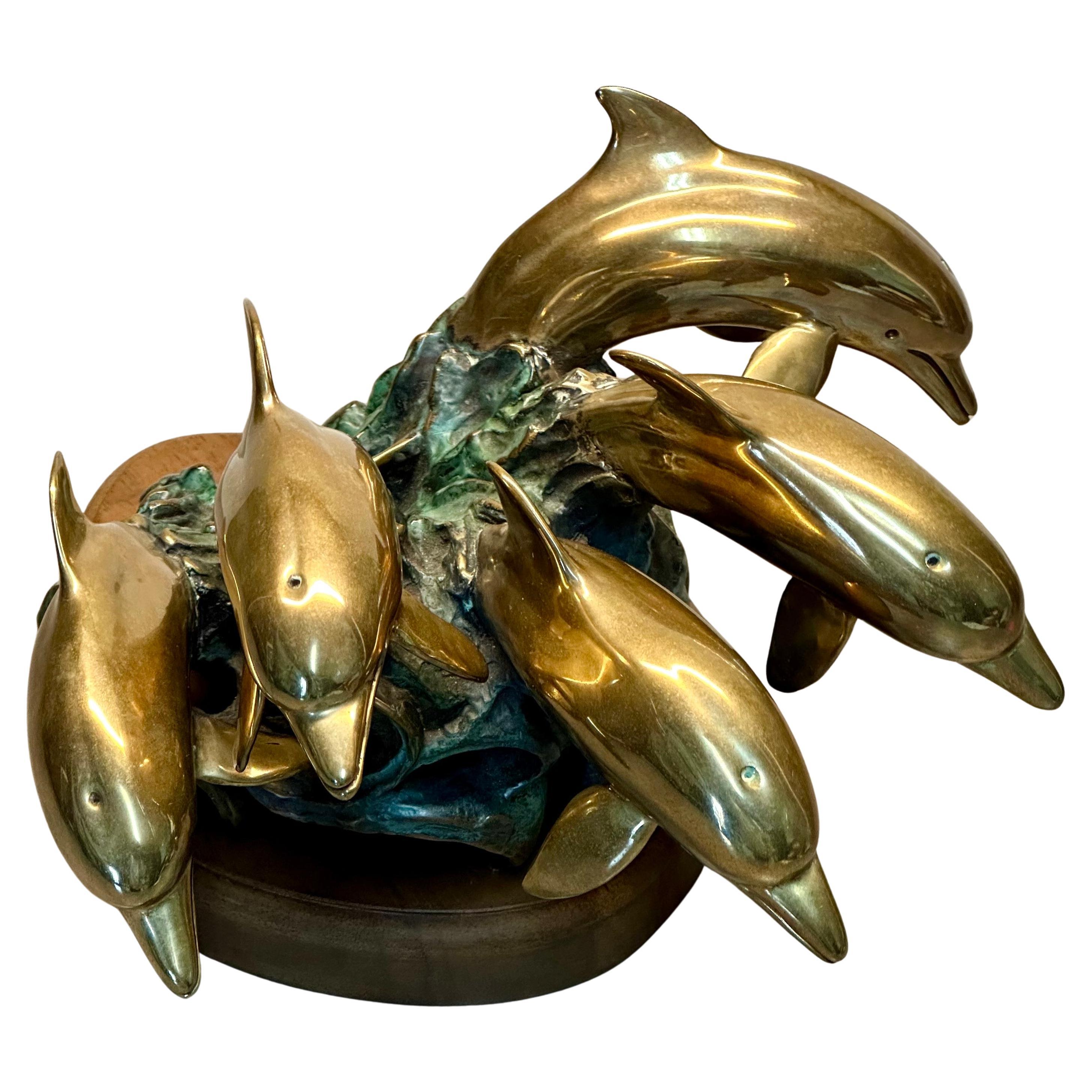 Vintage Bronze
Brass Dolphin Pod Sculpture on Wood Base, Signed