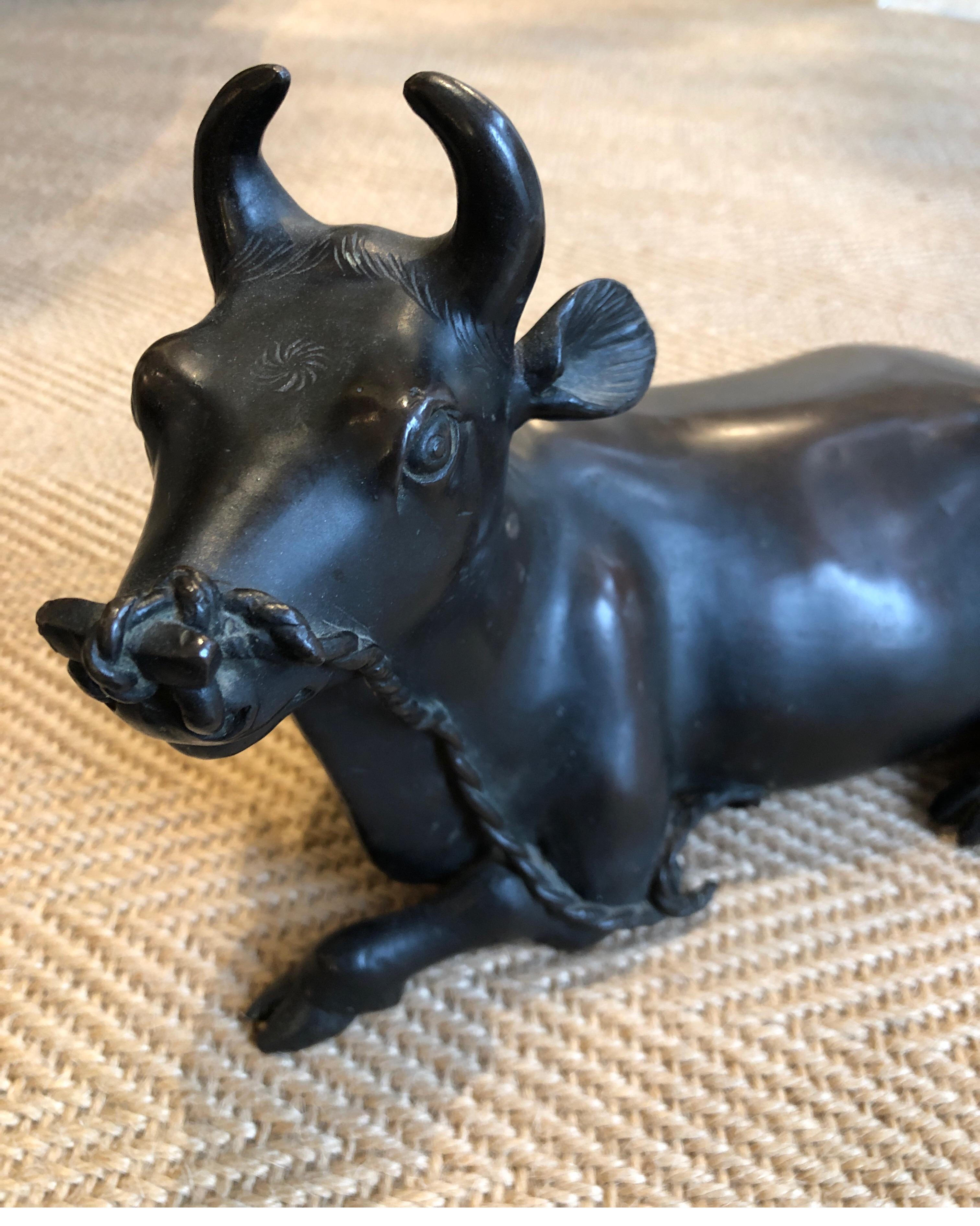 Vintage bronze bull. 
Measures: 13” L x 7.5” H x 6” W.
