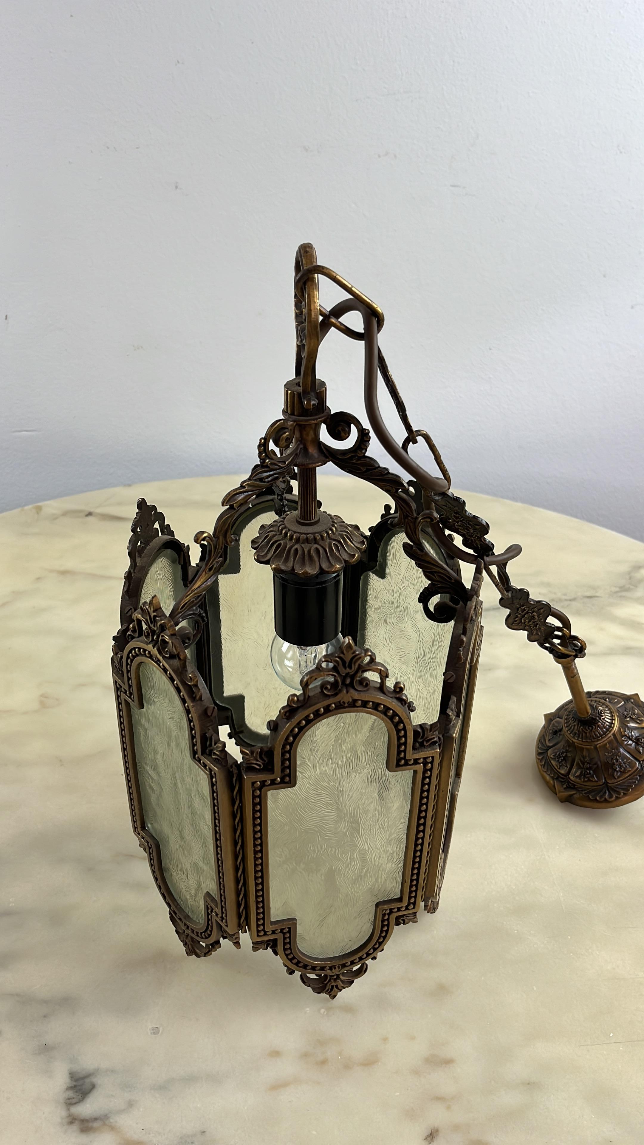 Vintage bronze chandelier, Italy, 70s
Intact and functioning. Height with chain 92 cm.