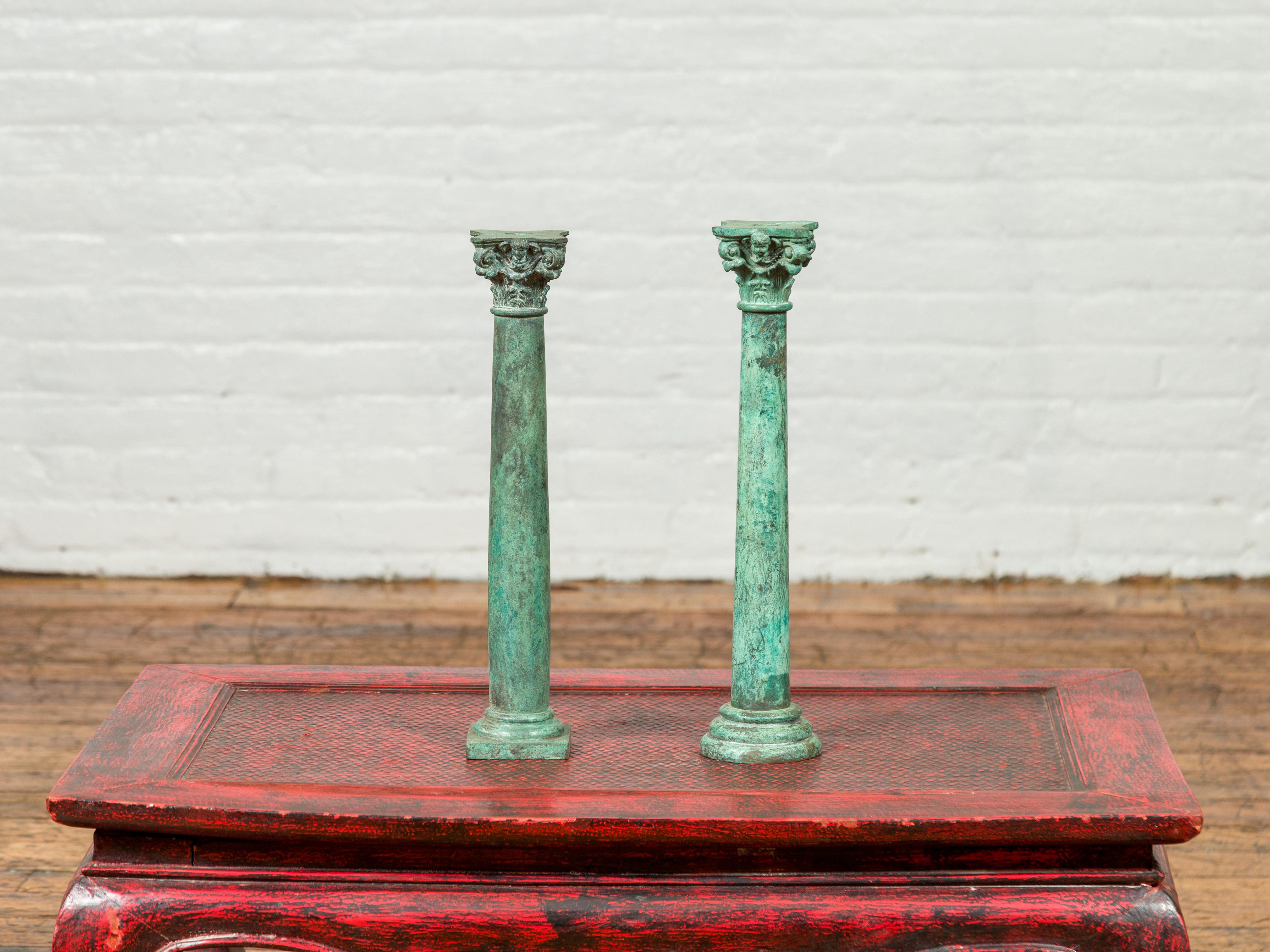 Asian Vintage Bronze Corinthian Column Candlestick with Verdigris Patina and Cherubs