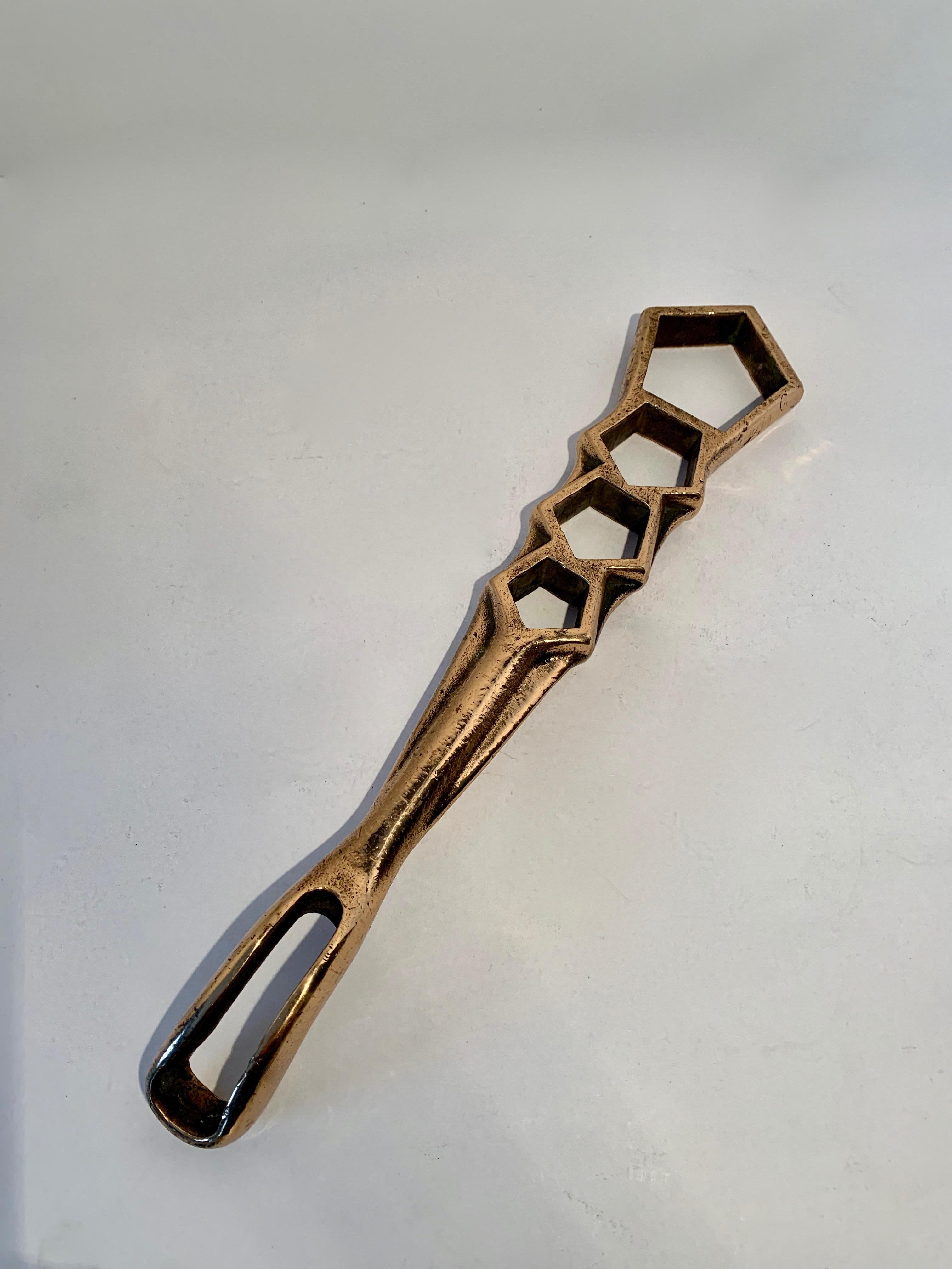 Vintage fire hydrant wrench, a solid bronze piece which can still be used as a wrench, however, due to the wonderful sheen and weight makes a great, well sized paper weight or decorative piece.