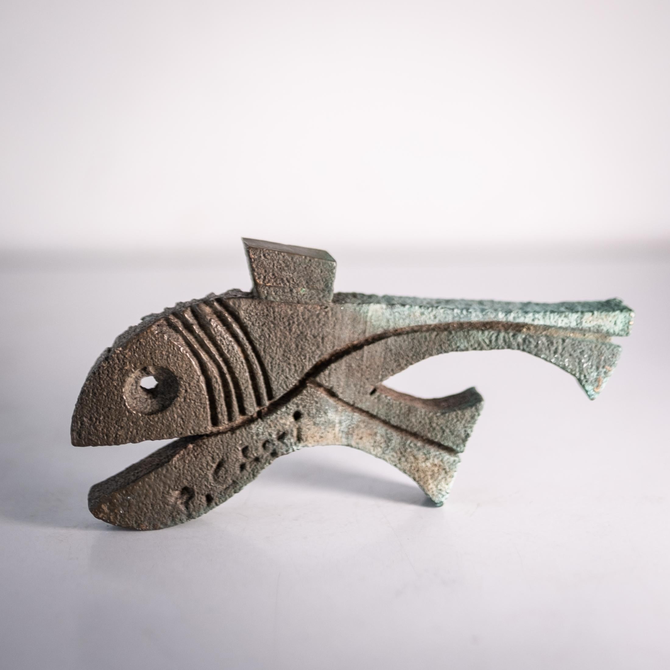 Vintage bronze fish sculpture by Paolo Soleri. Fantastic patina. Signed.

Paolo Soleri (1919-2013), the founder of Cosanti and Arcosanti, was an important artist, architecture, philosopher and urban planner. The Italian architect studied with