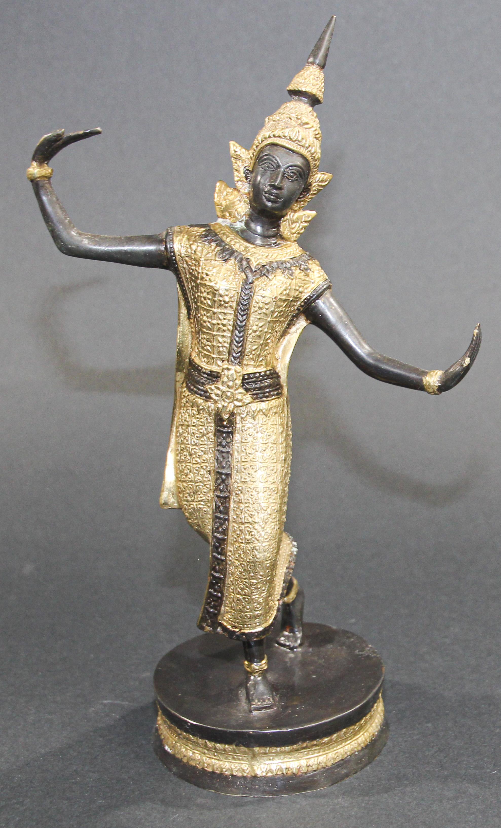 Vintage statue in gilt bronze metal of Thai Teppanom Temple Guard Dancing statue sculpture.
Vintage Handcrafted Gilded Thai Teppanom Temple Guard Dancer Dancing statue sculpture.
Intricate Asian bronze Thai Teppanom Angel Buddha statue in black