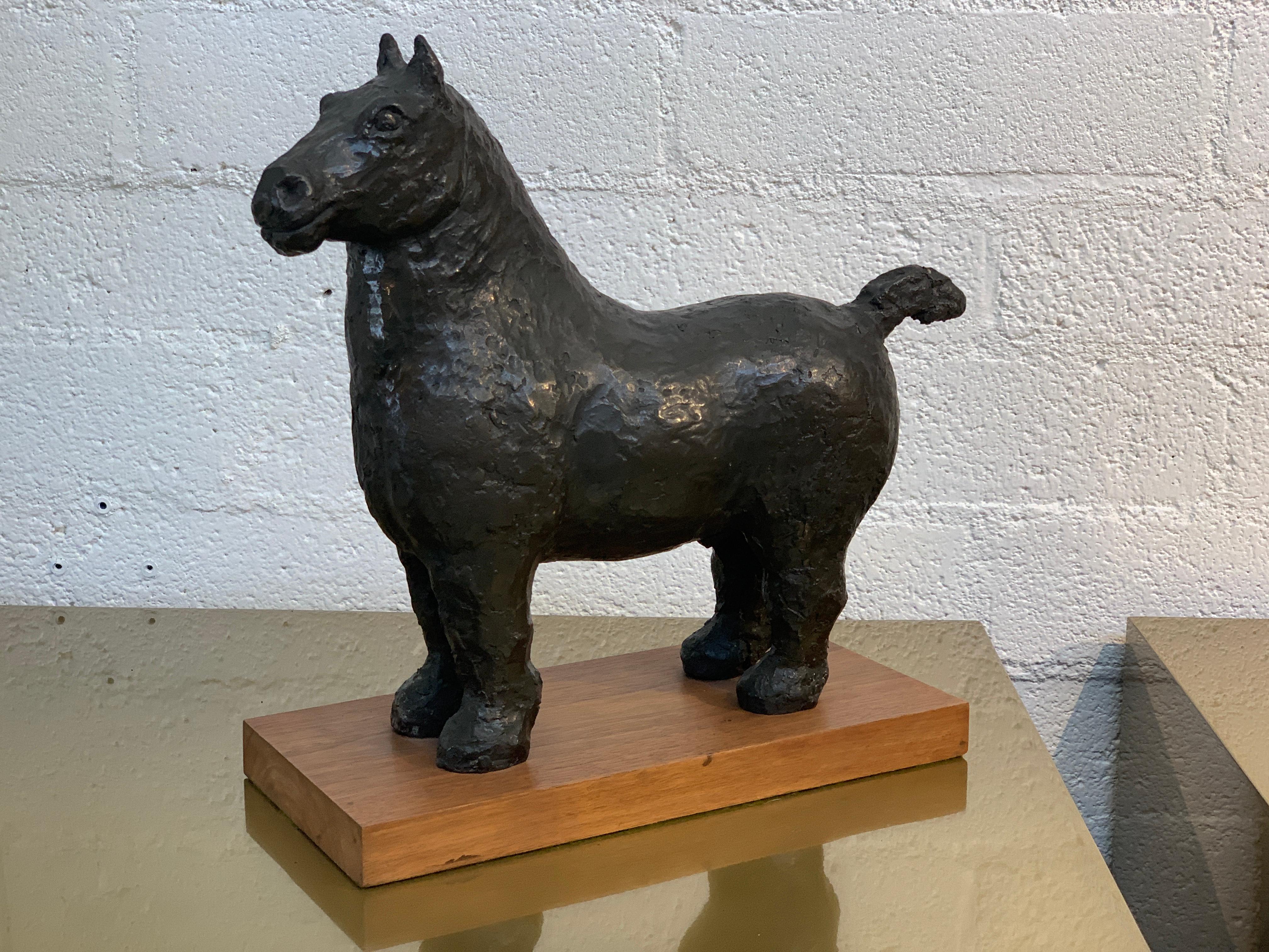 A vintage bronze horse which is unsigned. Great quality. Mounted on a wood base. The base has some losses. Bronze is in good condition, with some minor age imperfections and wear.