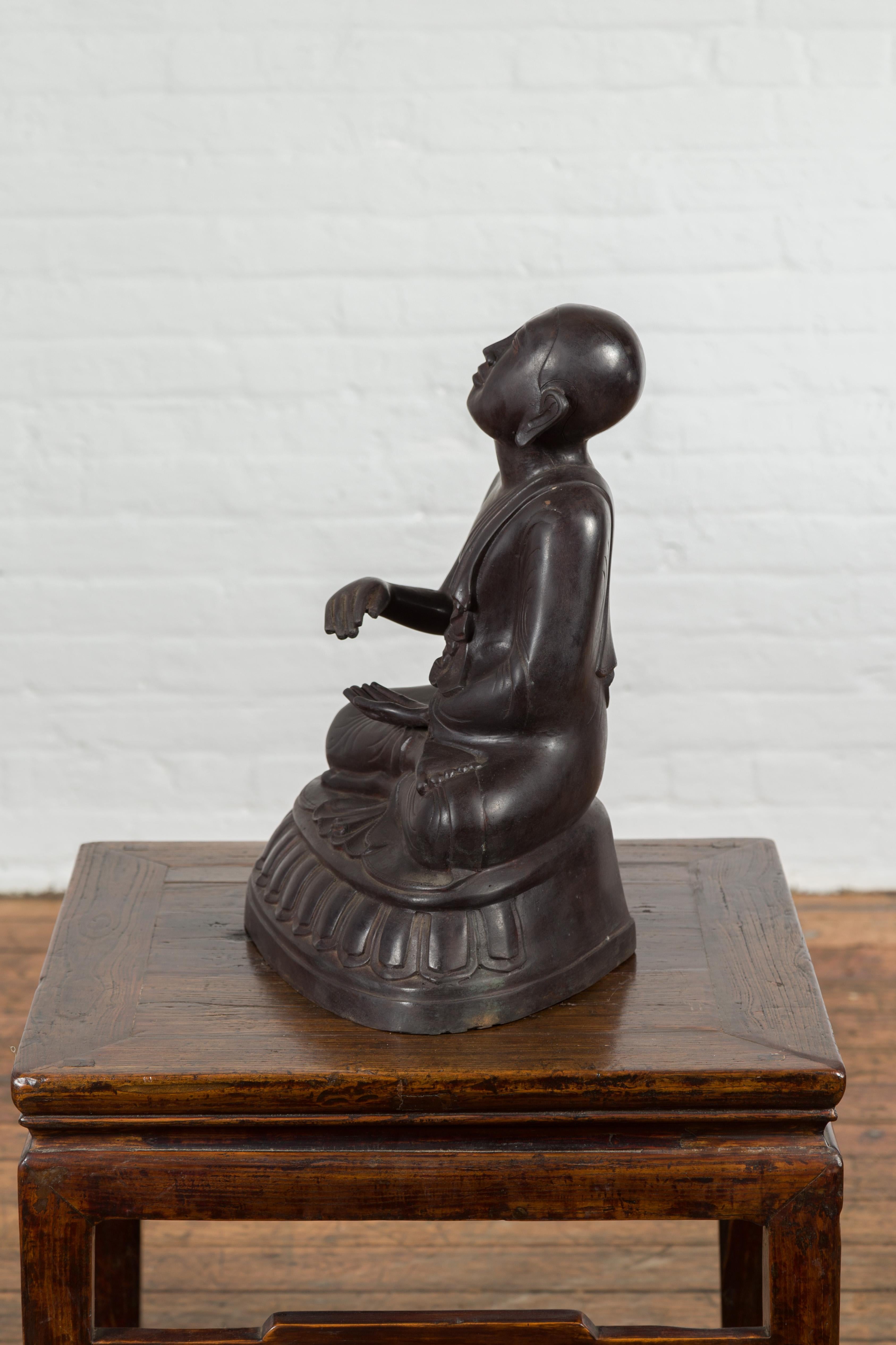 Vintage Bronze Lost Wax Sculpture Depicting a Praying Monk Sitting on a Base For Sale 7