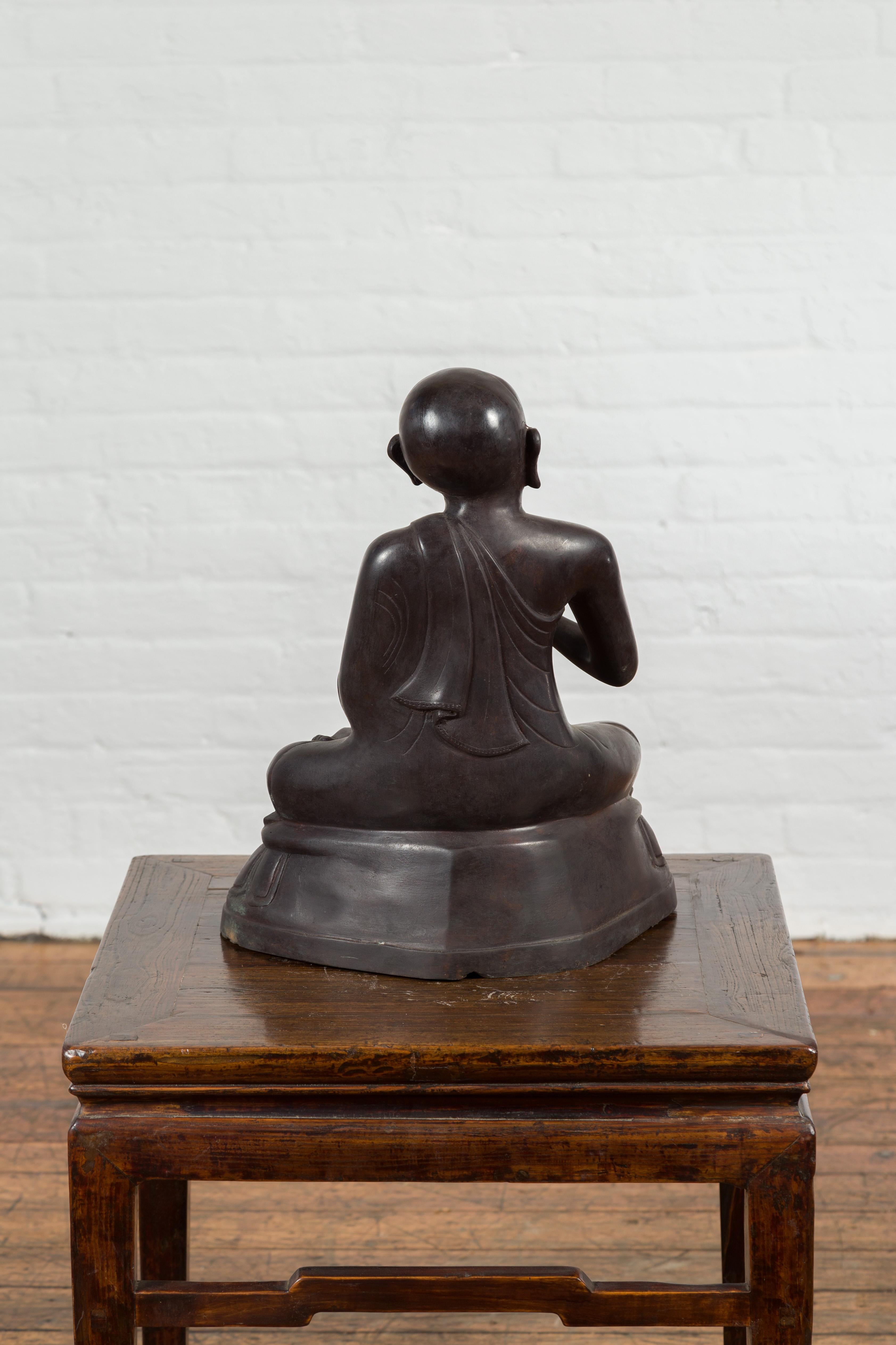 Vintage Bronze Lost Wax Sculpture Depicting a Praying Monk Sitting on a Base For Sale 8