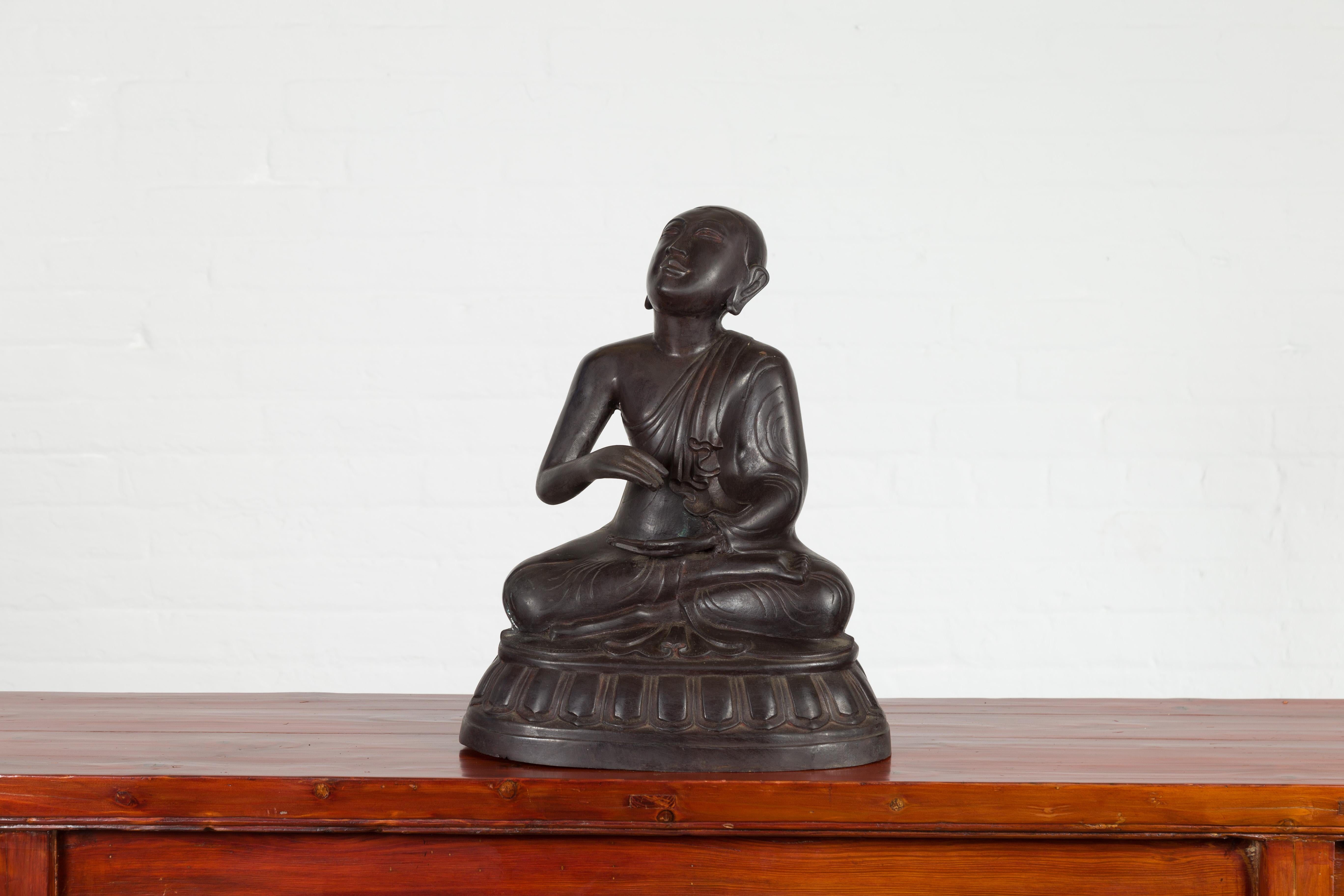 20th Century Vintage Bronze Lost Wax Sculpture Depicting a Praying Monk Sitting on a Base For Sale