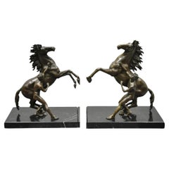 Scultura d'epoca in bronzo di cavallo e domatore di Marli dopo Coustou su base in marmo Coppia