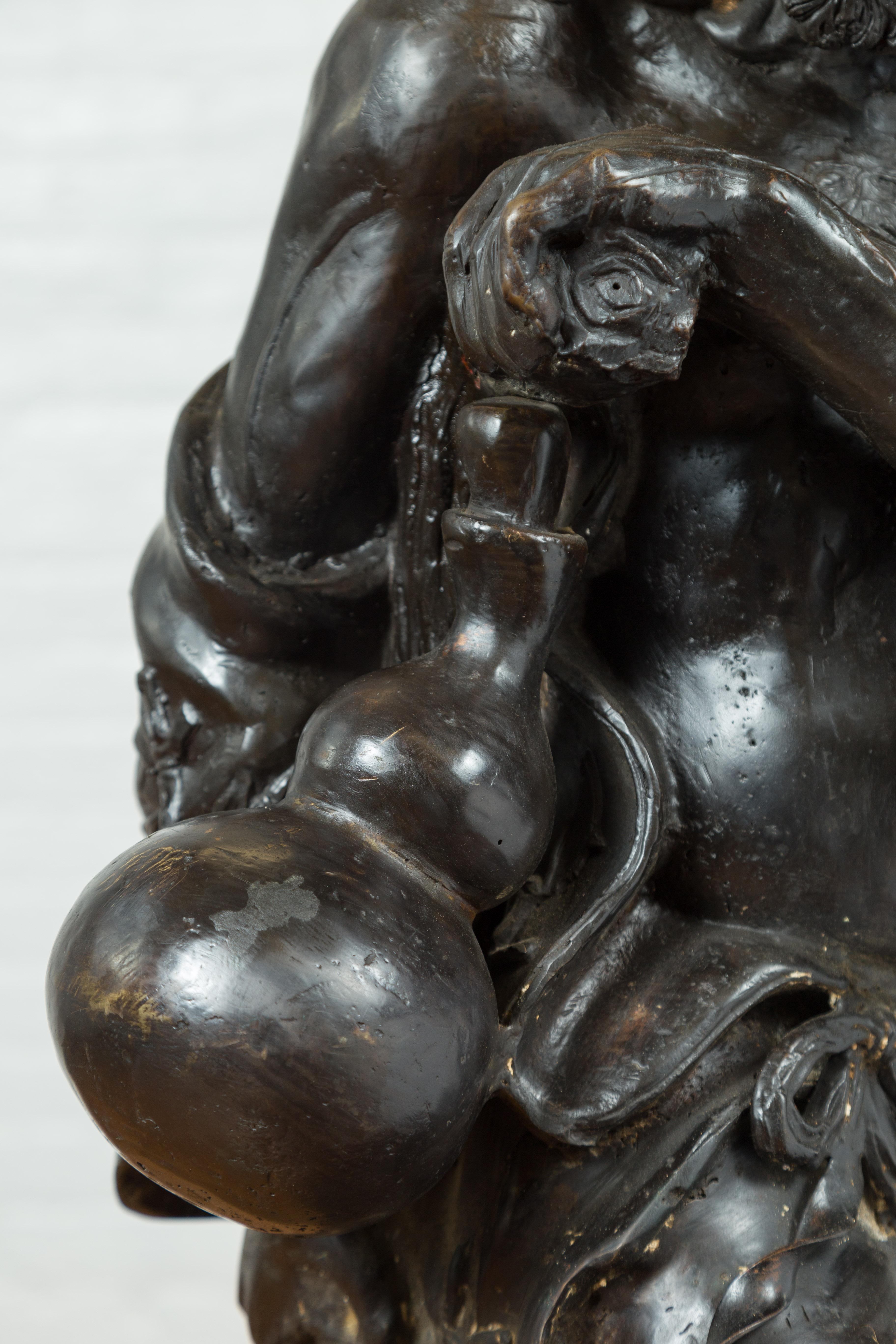 Vintage Bronze Sculpture Depicting a Mythical Warrior Holding a Flask For Sale 9